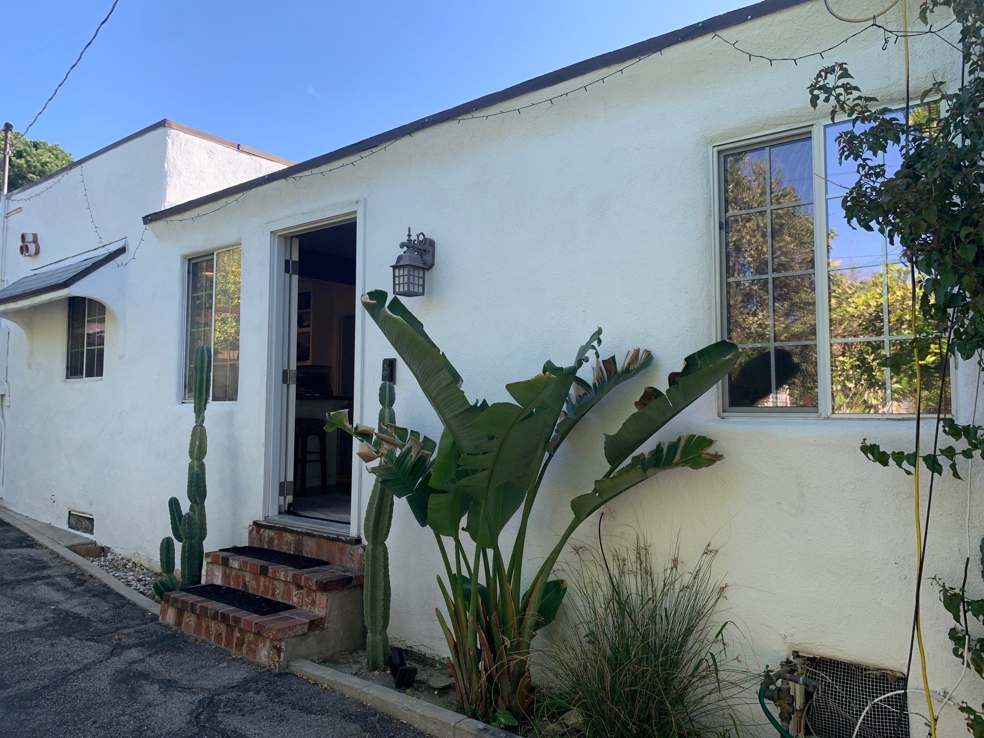 Window Installation using Black Anlin windows by American Window Company