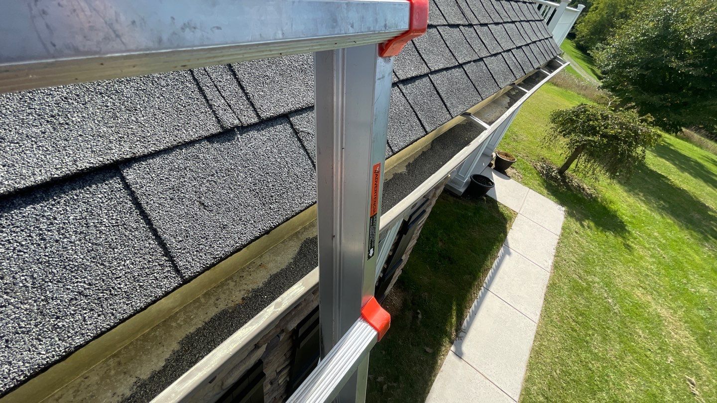Roof Damage using Certainteed Lifetime Roofing System- Moire Black Landmark Pro shingkes with shadow ridge caps. by BulletpROOF Exteriors