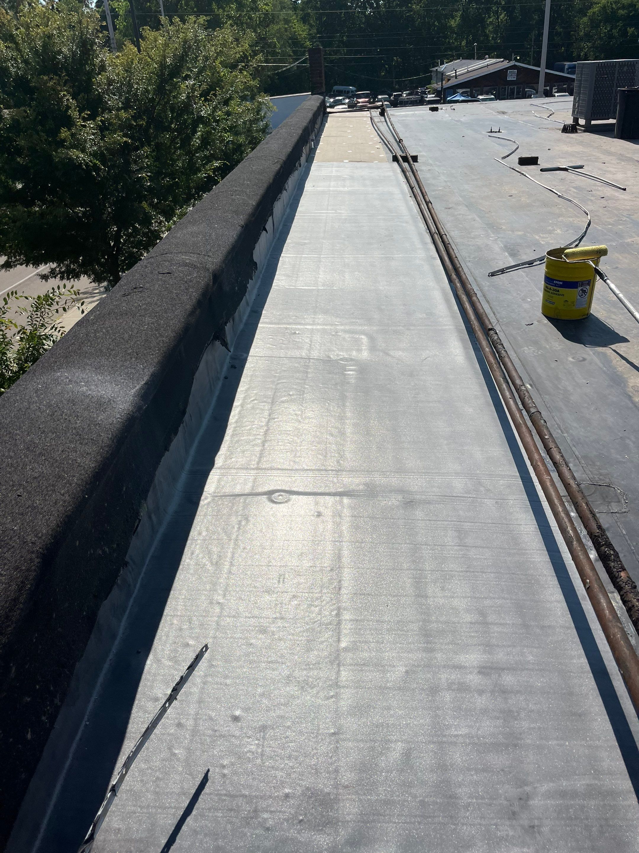 Commercial Roofing Repair using 60 mil rubber roof  by Nitro Roofing and Construction