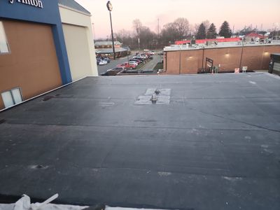 Commercial Roofing Installation using 60 mil rubber roof 