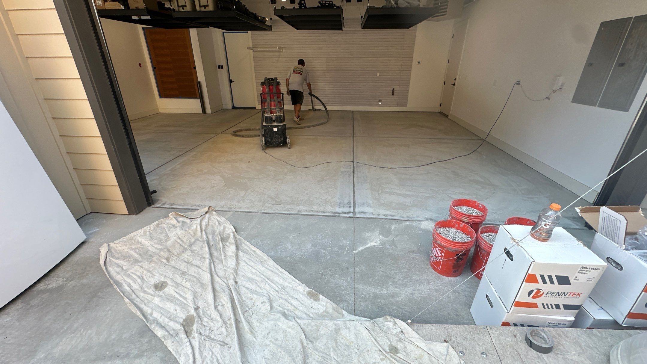 Garage Transformation using Pebble Beach by Croc Coatings, LLC