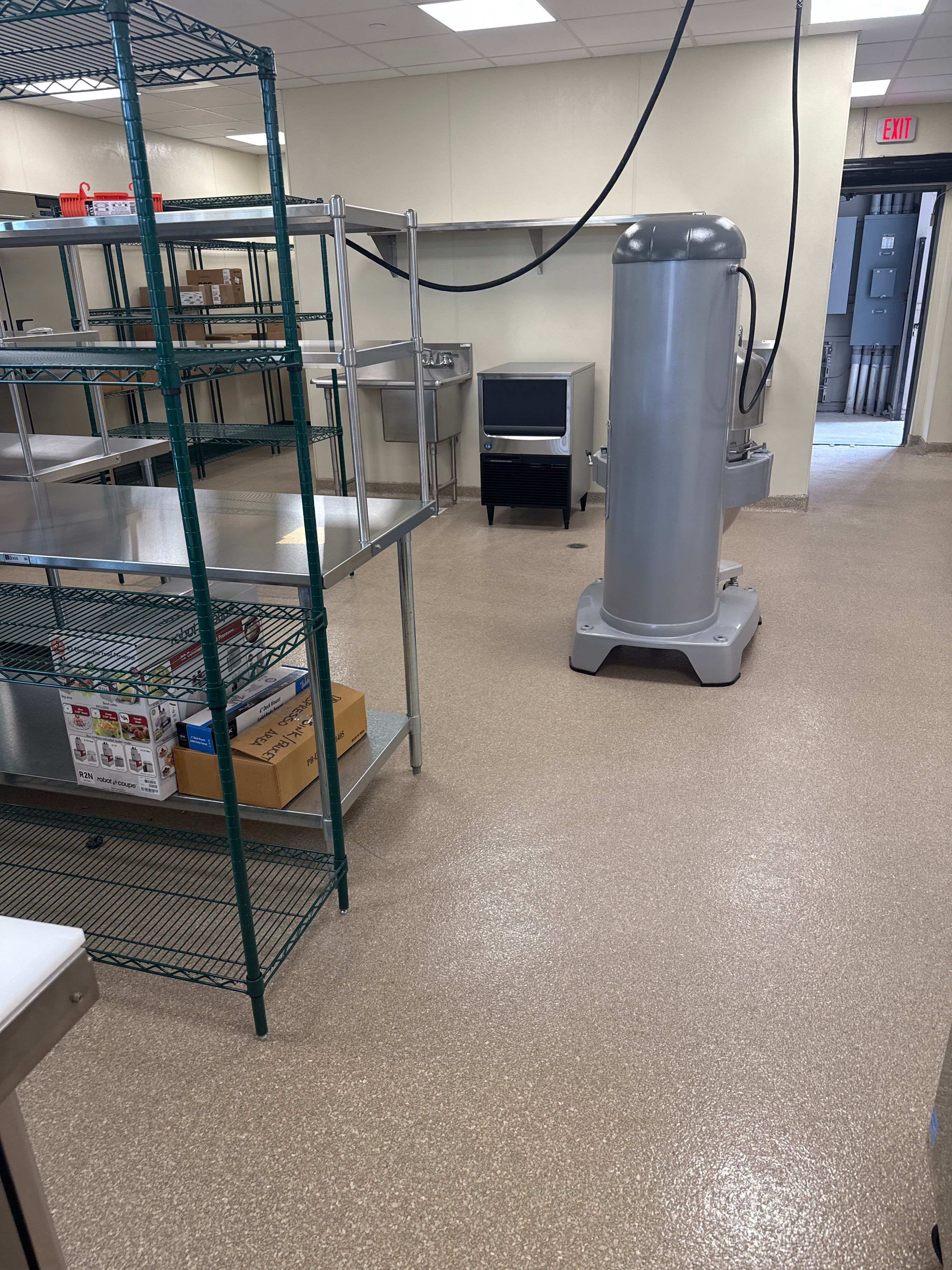 Industrial Epoxy Flake and Concrete Overlay Floor Installation in Pensacola by Cornerstone Hard Surface Restoration