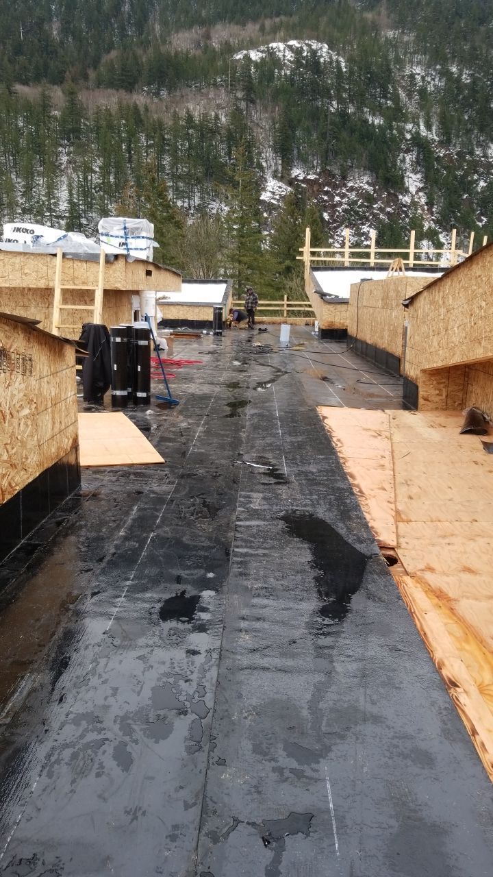 Commercial Roofing Installation using IKO 2ply sbs  by Top Notch Roofing Inc