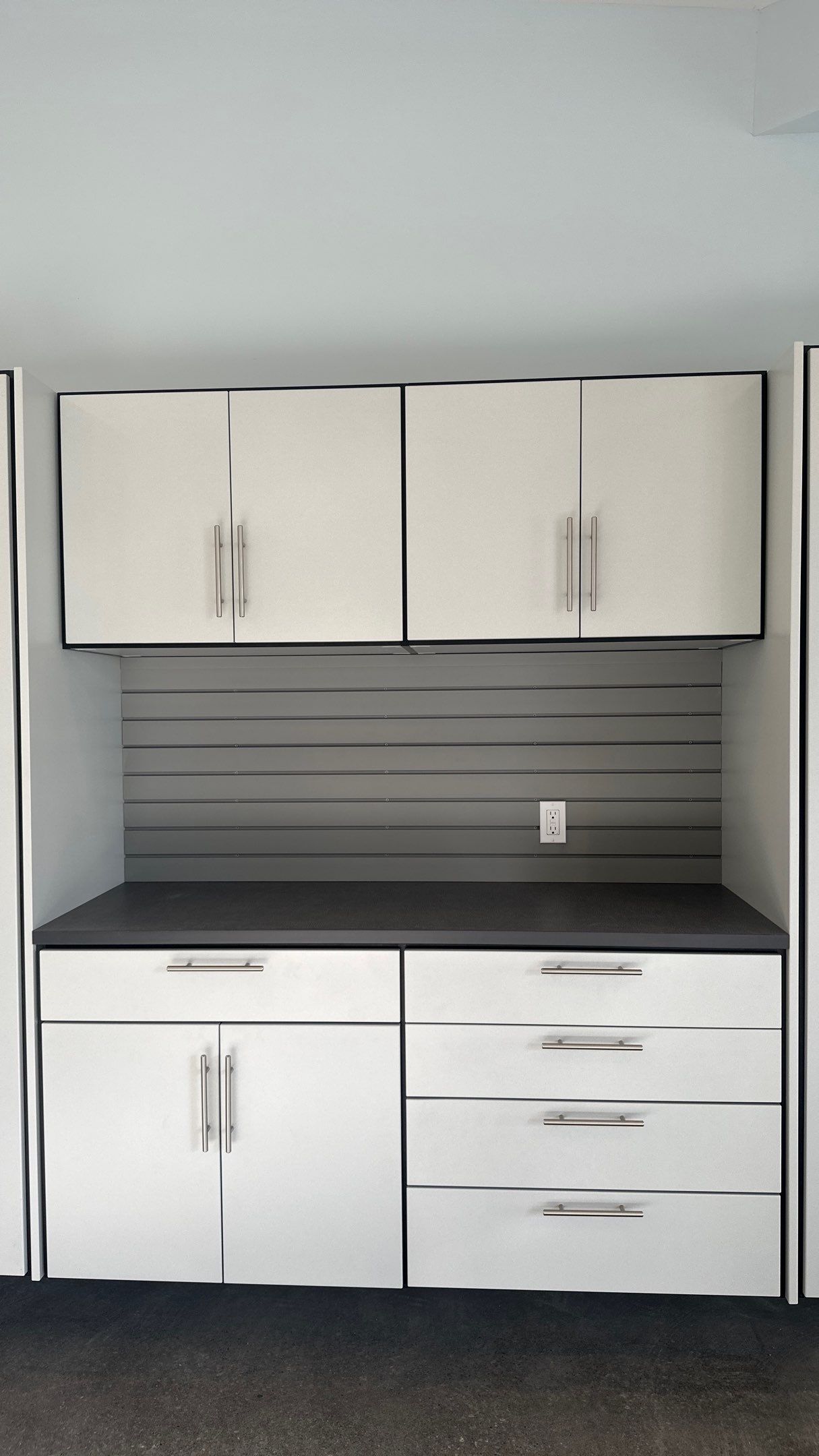Bryon V. upgrades garage with cabinets and heavy duty slatwall by Banner Garage