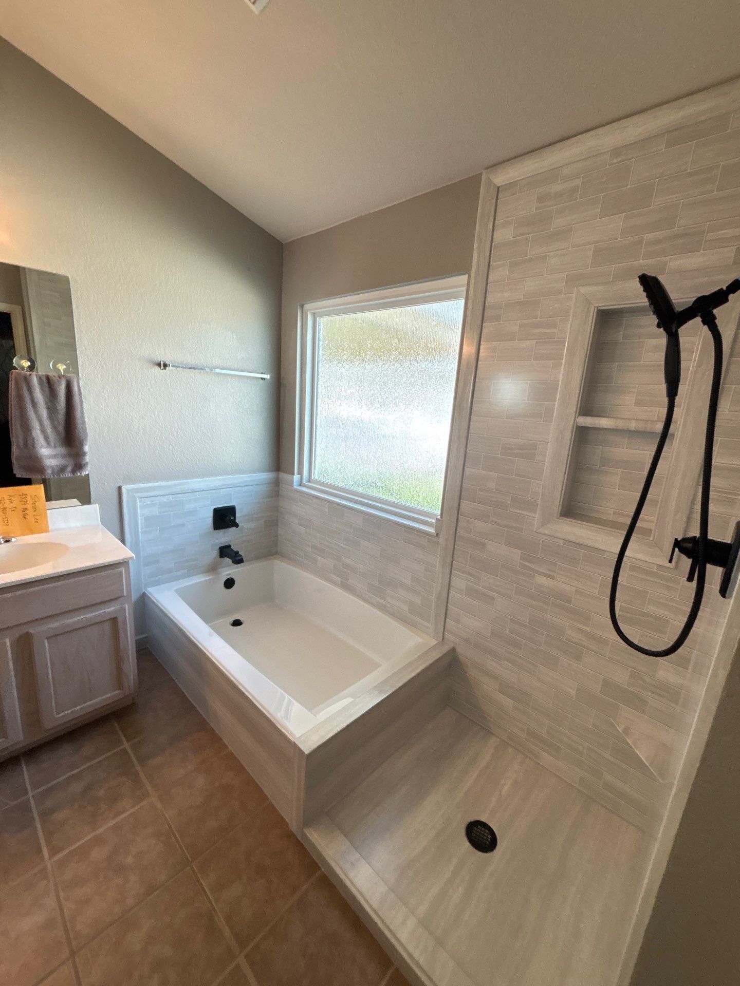 New walk in shower and tub in Kyle by Lane Lauritsen - The Hill Country, Texas