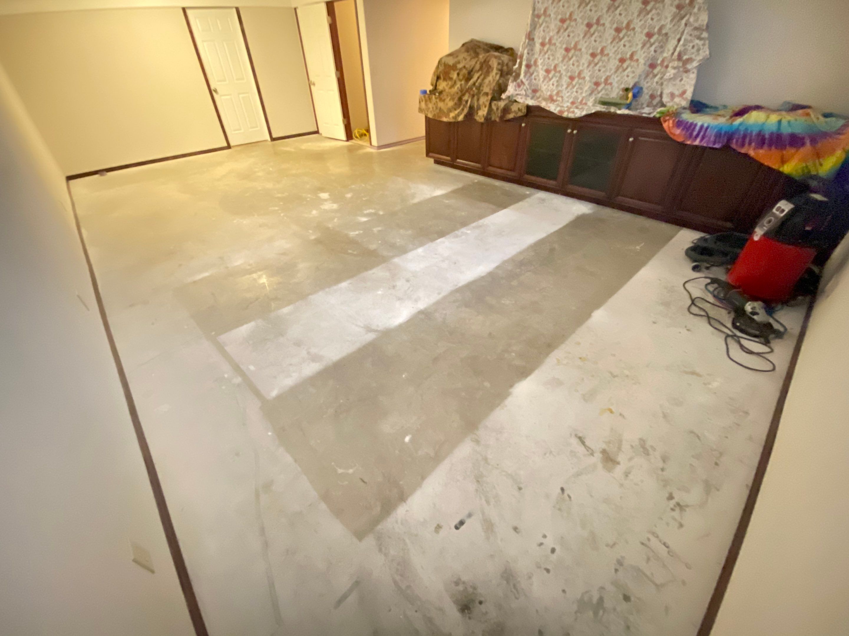 Basement Transformation using Ash Colorway by Croc Coatings, LLC