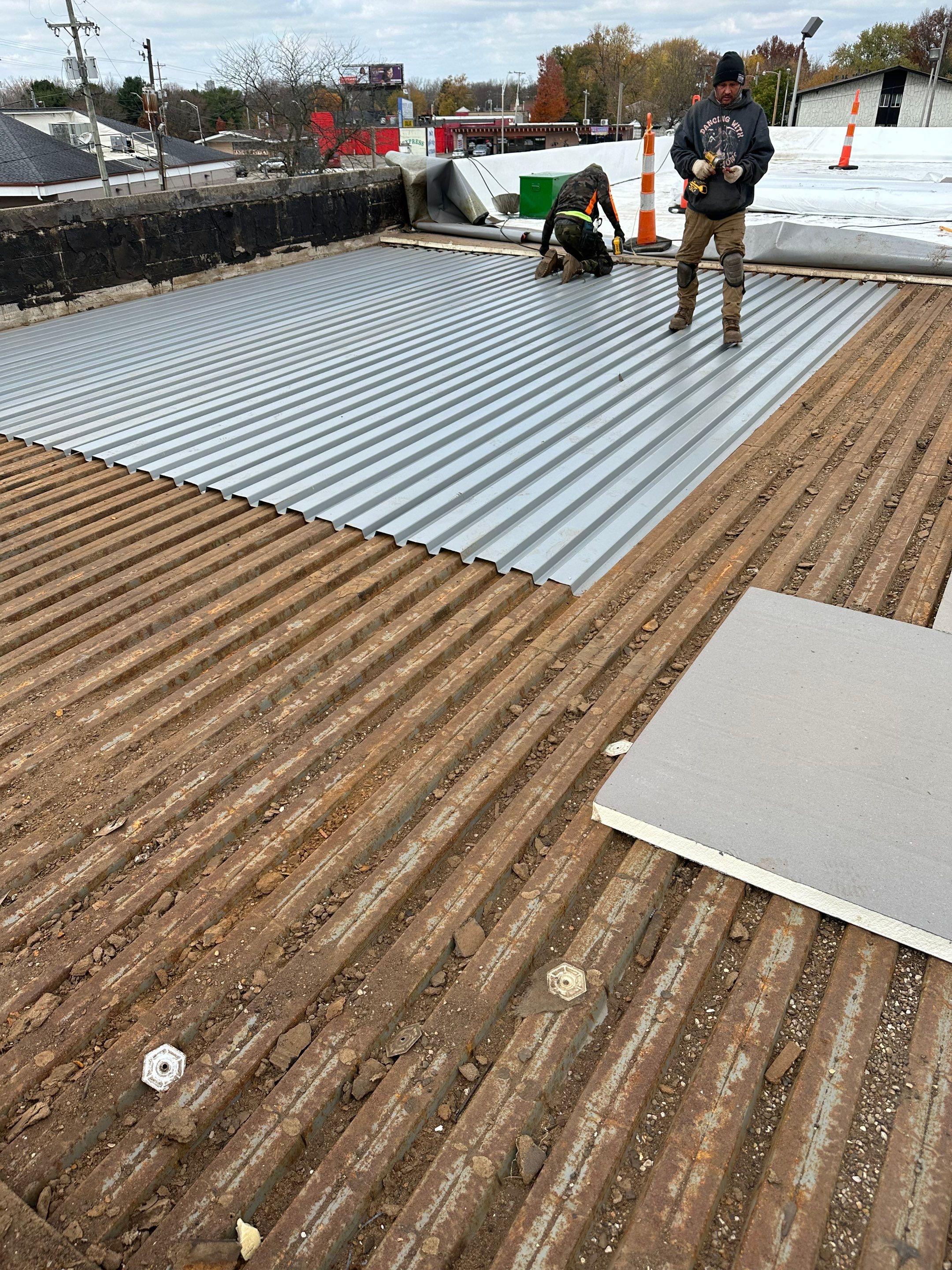 Commercial Flat Roof Replacement by Assured Restoration