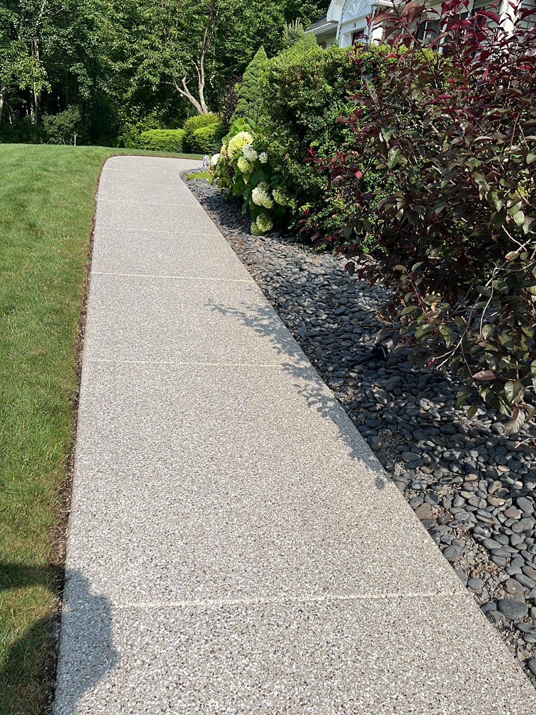 Scarelli Garage & Walkway TransFLOORmation by Symphony Concrete Coatings