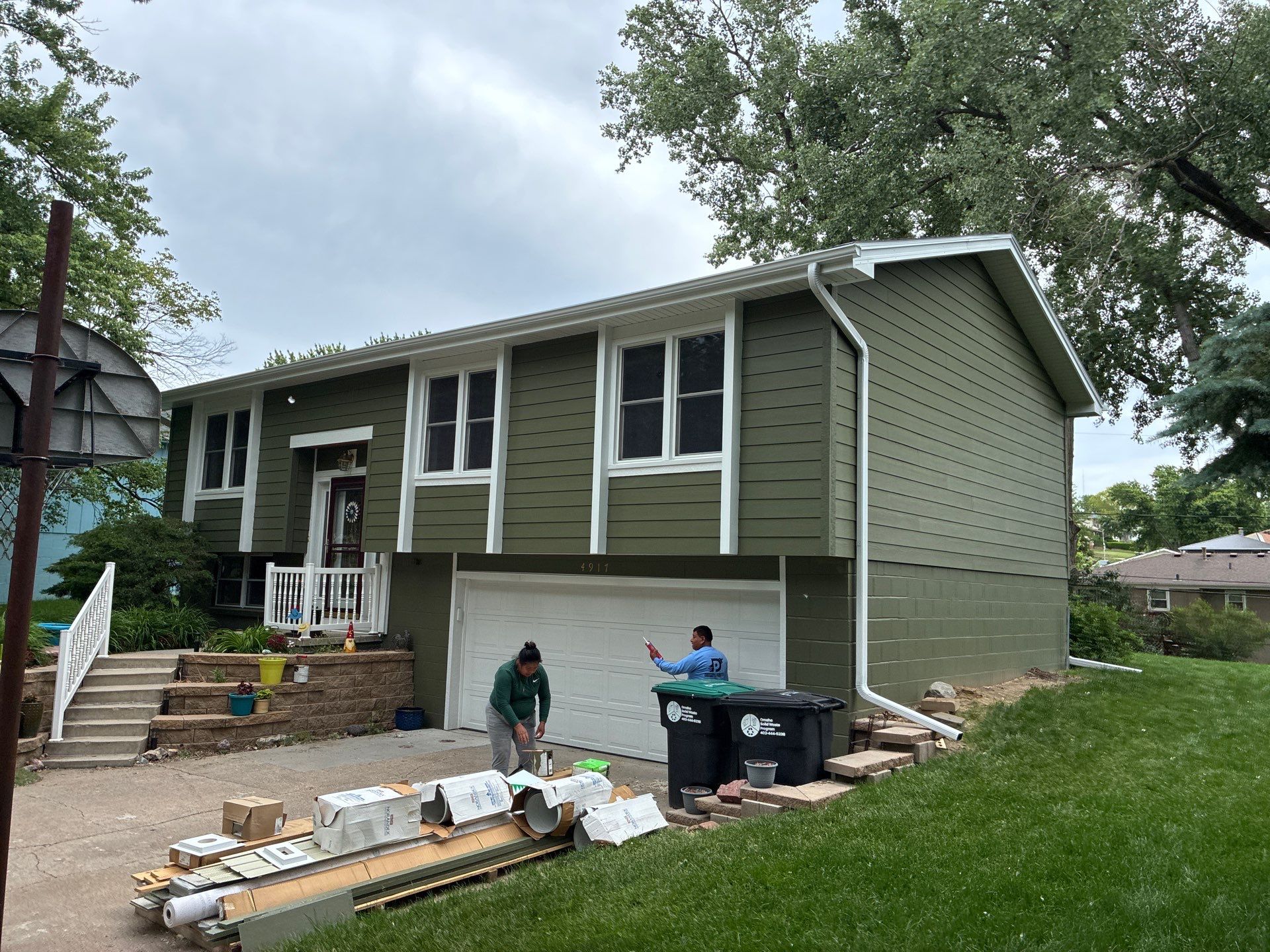 James Hardie Siding Replacement in Omaha with Mountain Sage Finish by Carps Complete Exteriors