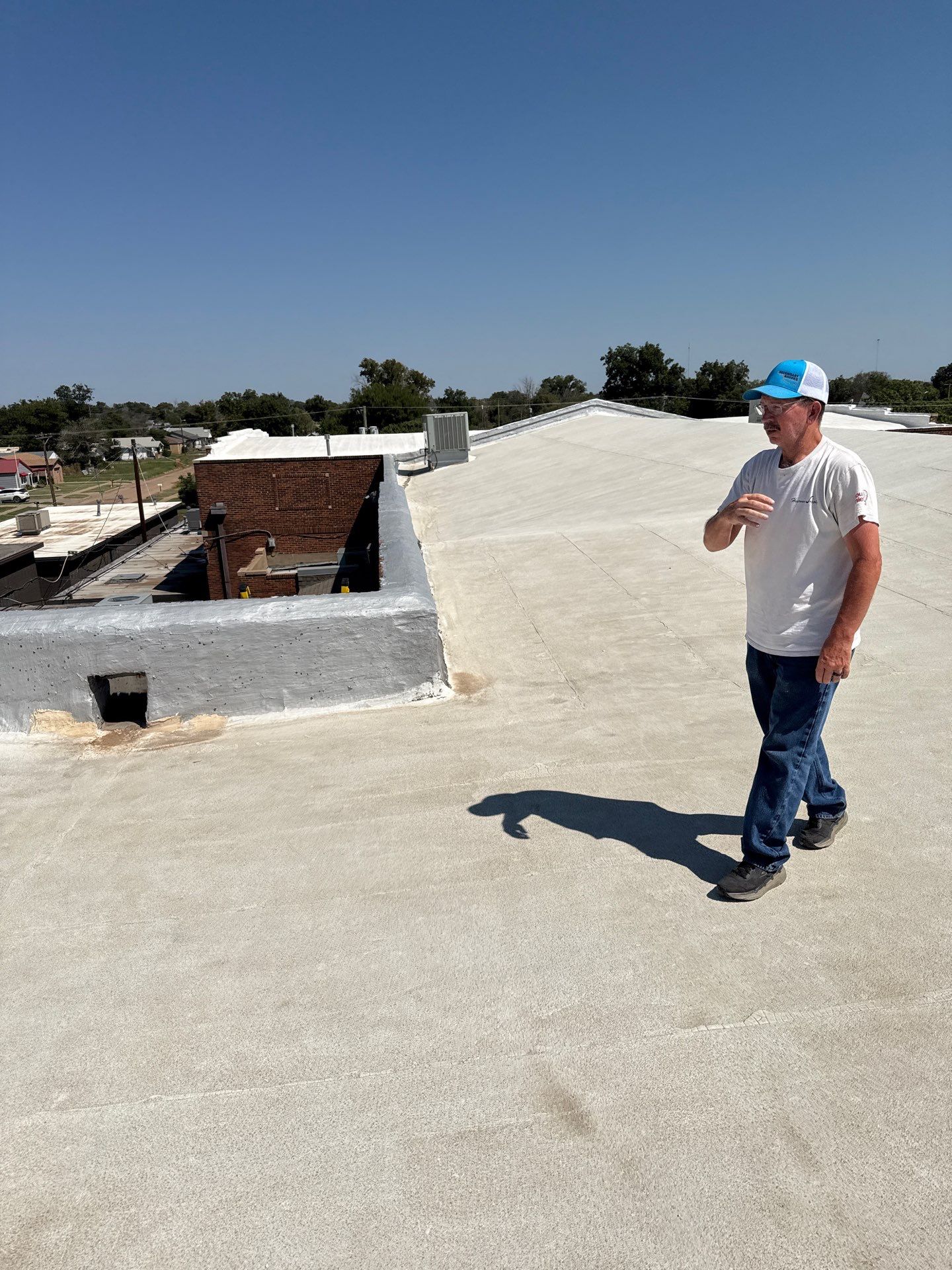 Hollis High School Comprehensive TPO Roof Replacement and Restoration by Secondary Rhodes