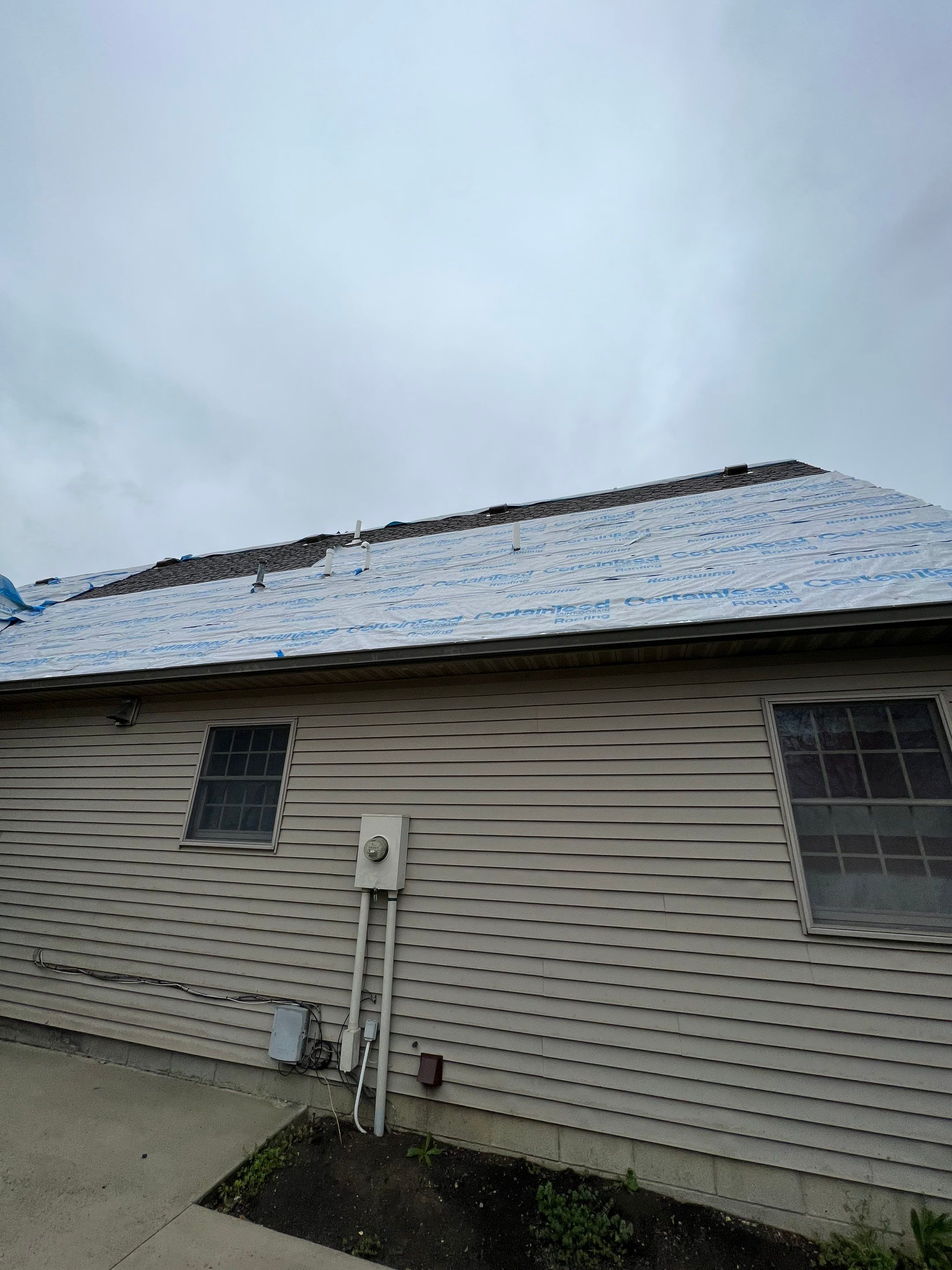 Residential Roofing Repair using Metstar Stone Coated Charcoal by Nitro Roofing and Construction