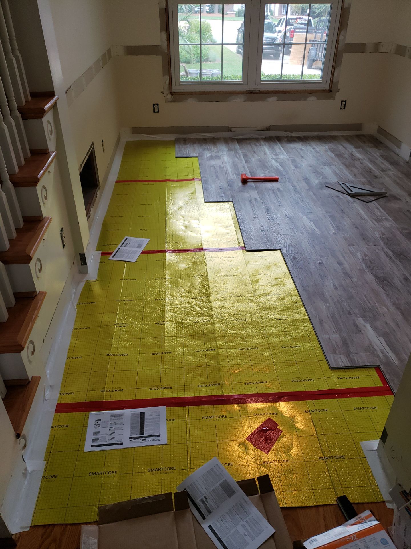 Front Room Transformed into a Waterproof Pet Room by A Step Above Handy LLC 