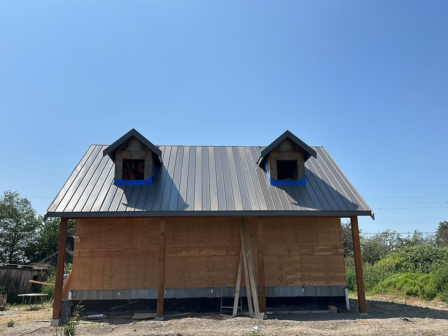 Agricultural Roofing Installation using 12" Prolok metal  by Top Notch Roofing Inc