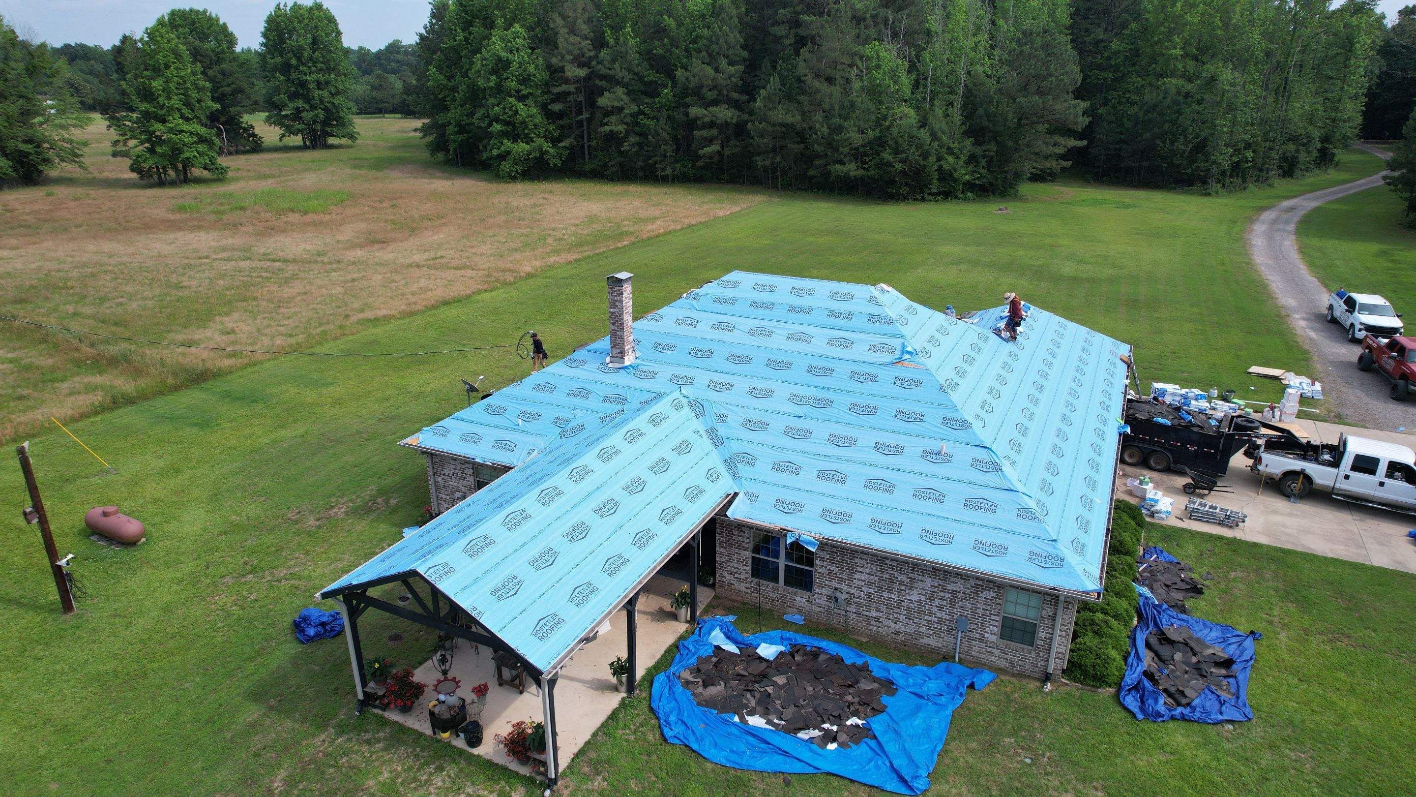 Storm Restoration Reroof: 40 Year Impact Rated Architectural Shingles by Hostetler Roofing