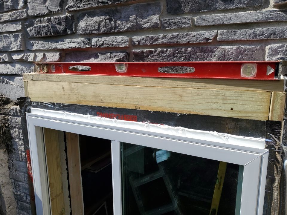 Egress Window Installation using Rockwell Egress Fiberglass Egress Window Well by Toledo Basement Repair 