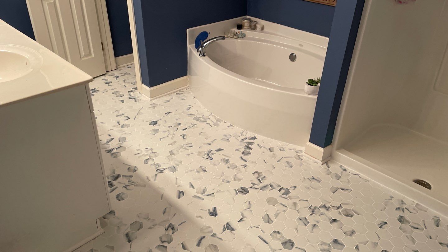 Bathroom Remodel using Tile by Footprints Floors of Coastal Carolina