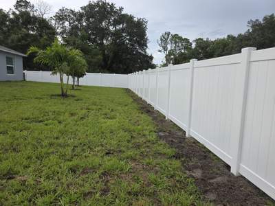 White Vinyl Privacy Fence with Gate Installation in North Port