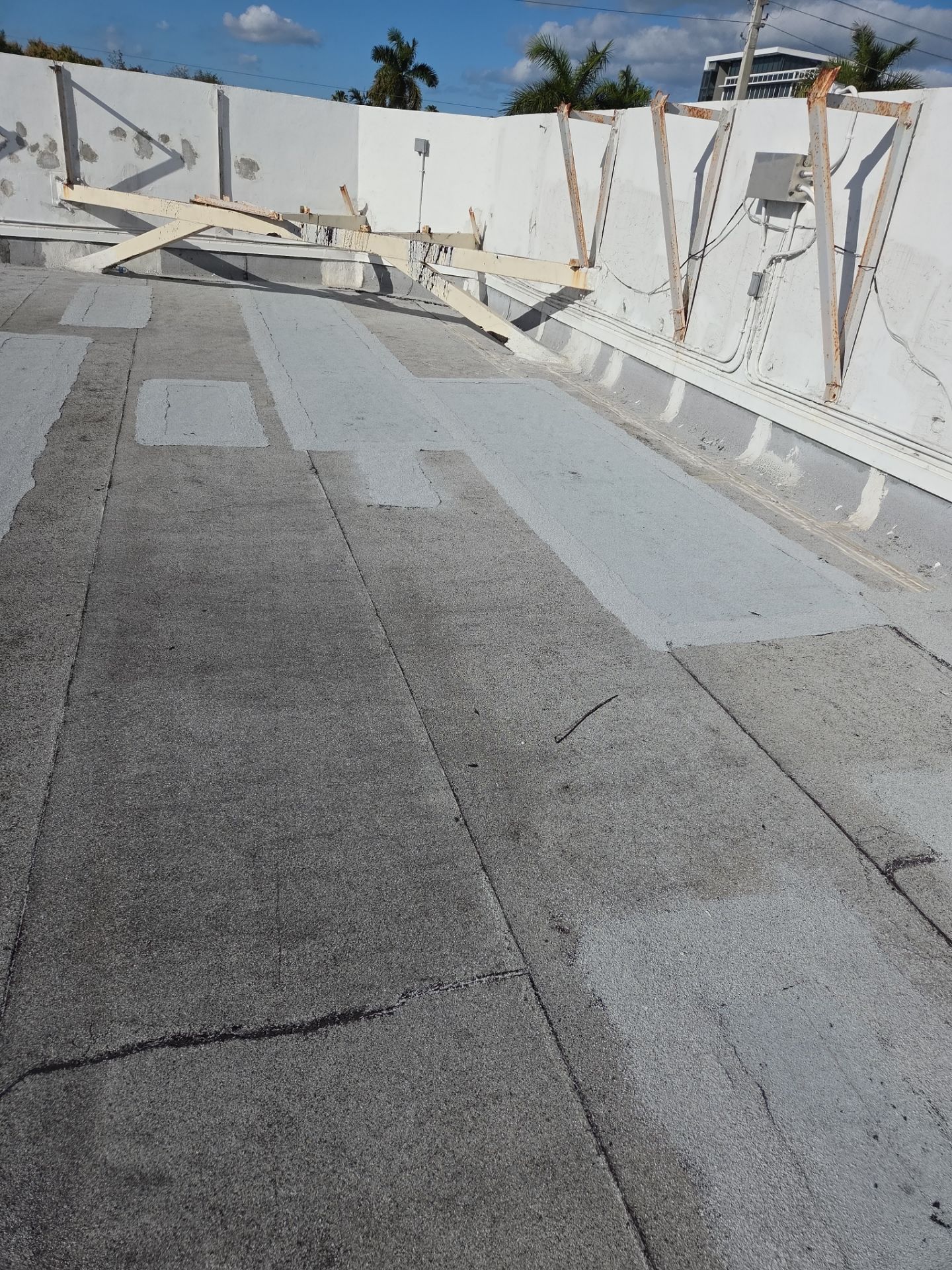 Commercial Flat Roof Restoration Using Silicone Coating in Hallandale Beach by Aastro Roofing