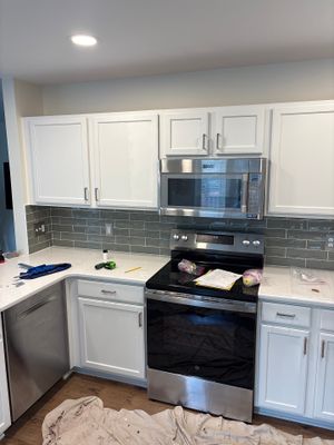 White Shaker Cabinet Installation and Quartz Countertop Replacement in Rochester