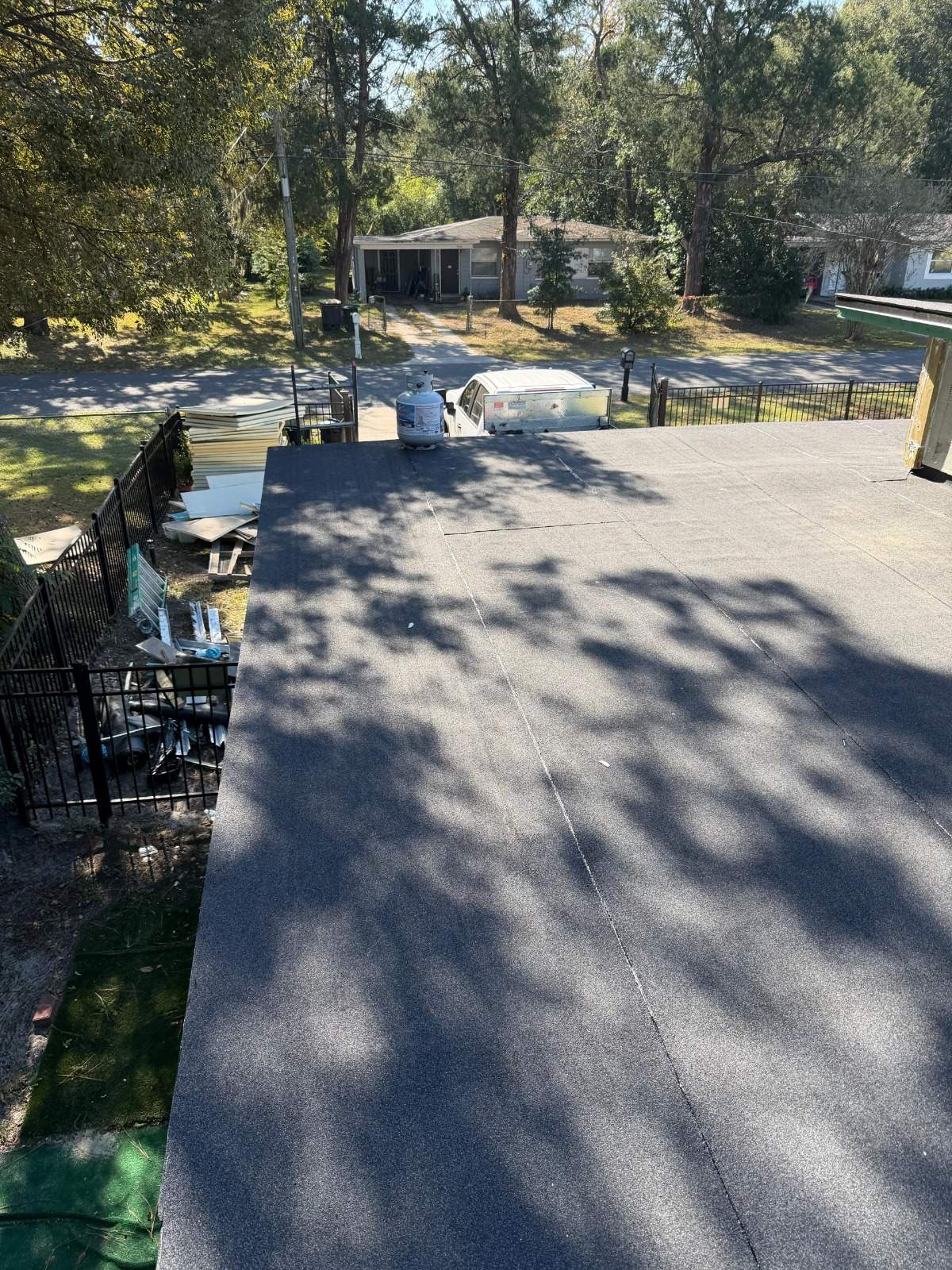 Flat Roof Renovation Due to Water Accumulation by urban green energy llc