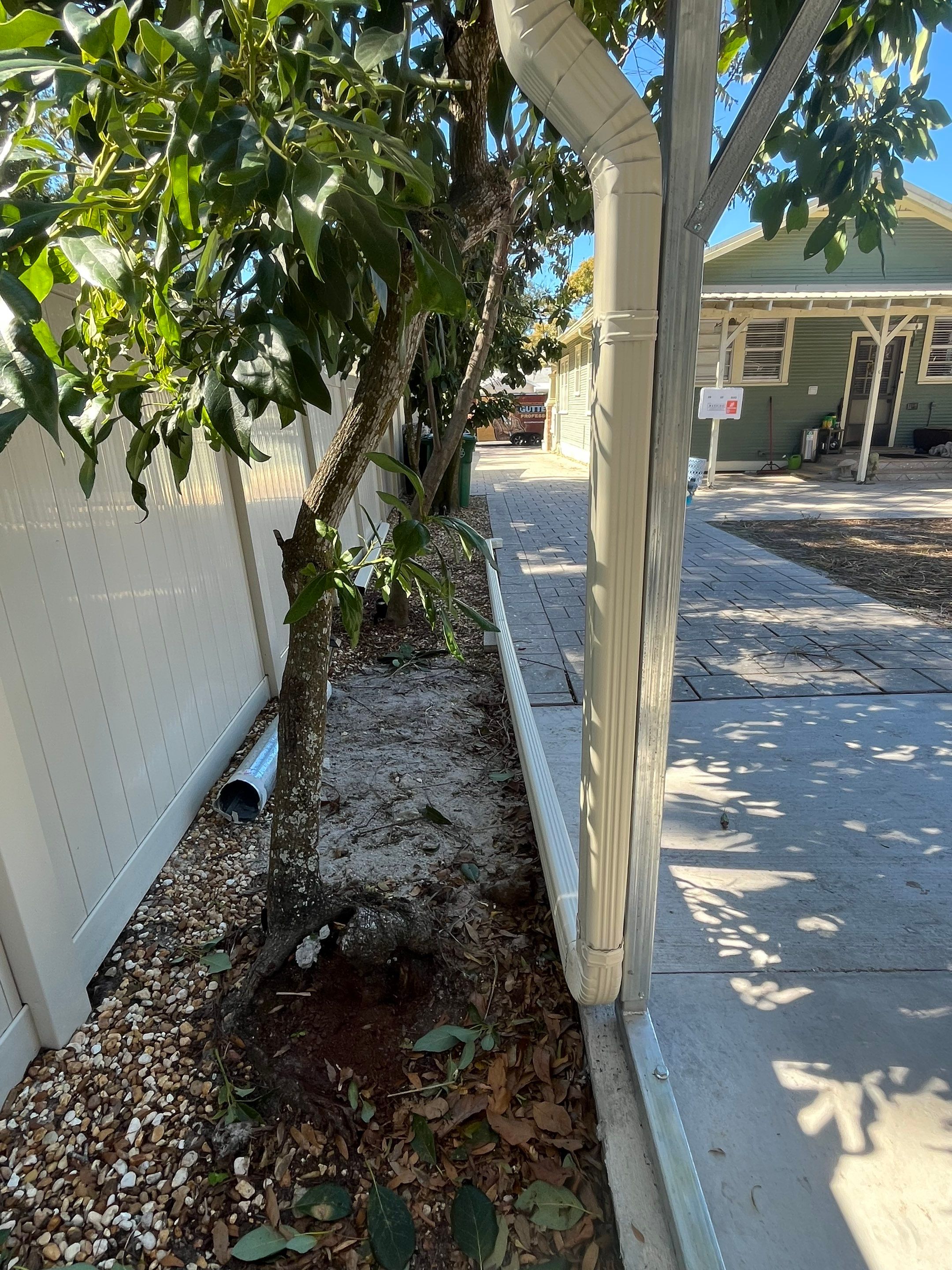 White 6-inch K-style Gutters and Down Spouts using Seamless Gutters White Down Spouts in Tampa FL by Gutter Professors