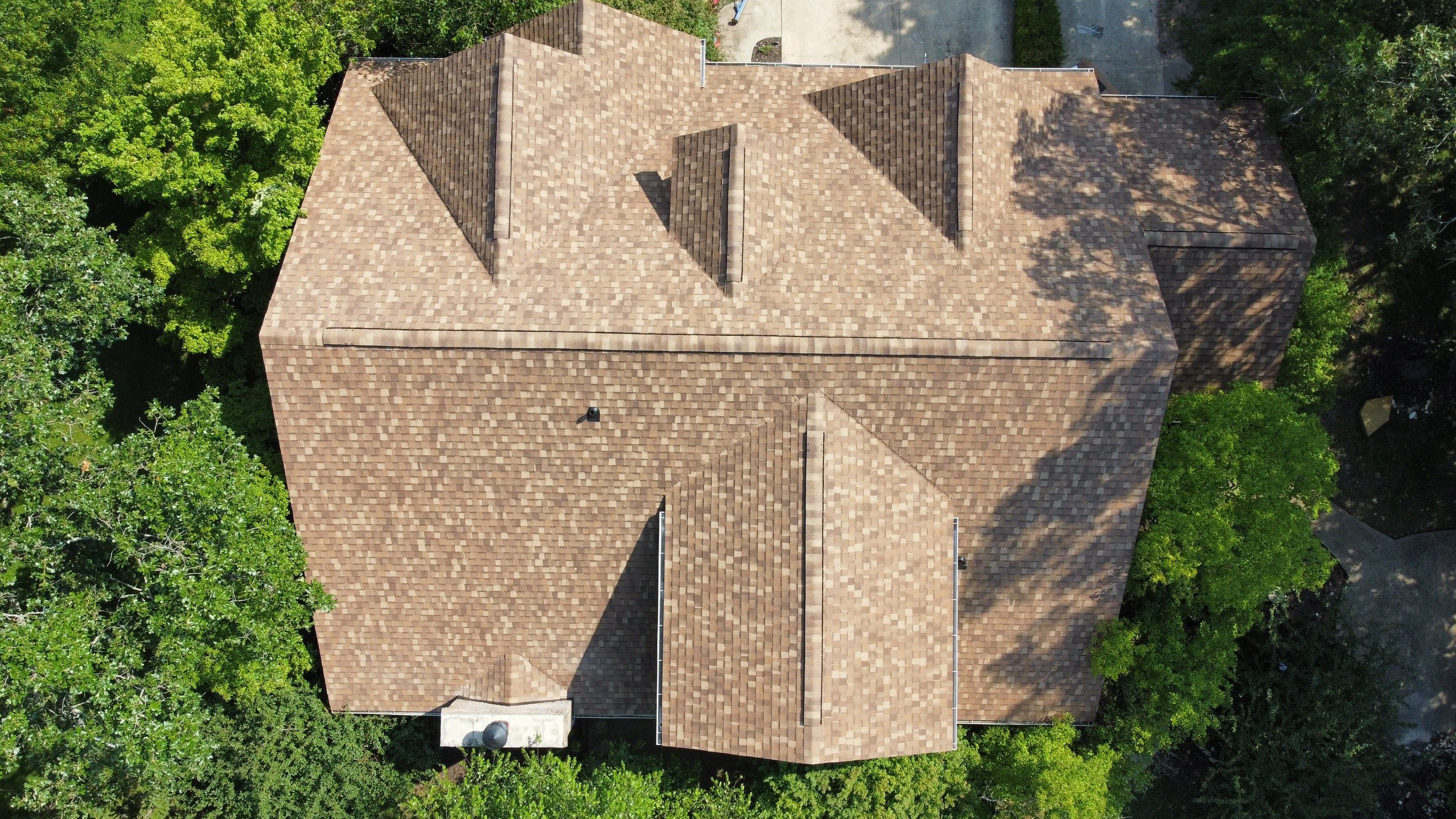 Residential Roof + Gutters & Downspouts & Gutter Guards  by Titan Commercial & Residential Roofing 