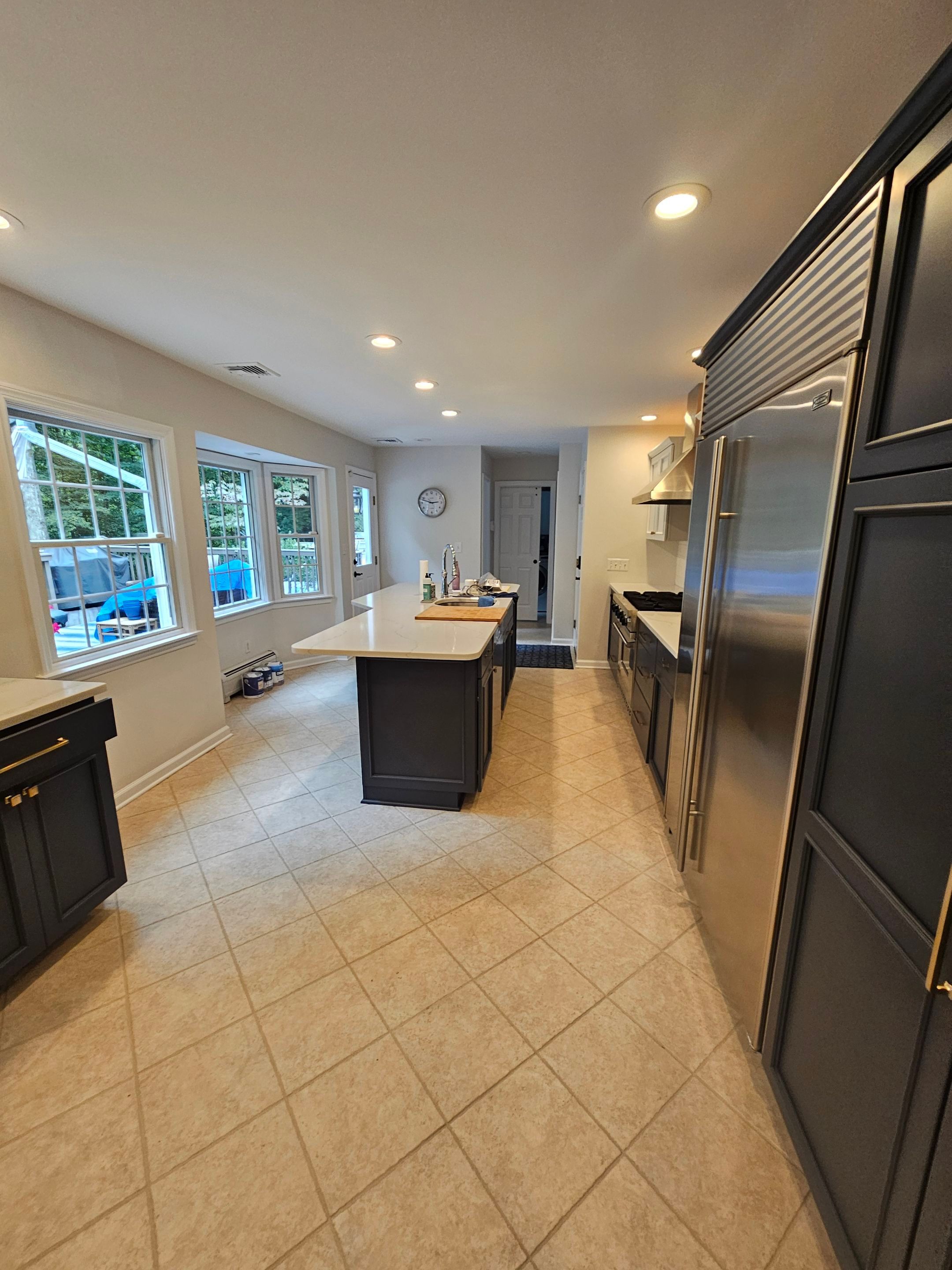 Chic Kitchen Cabinet Refinishing Project by Spectrum Painting, LLC