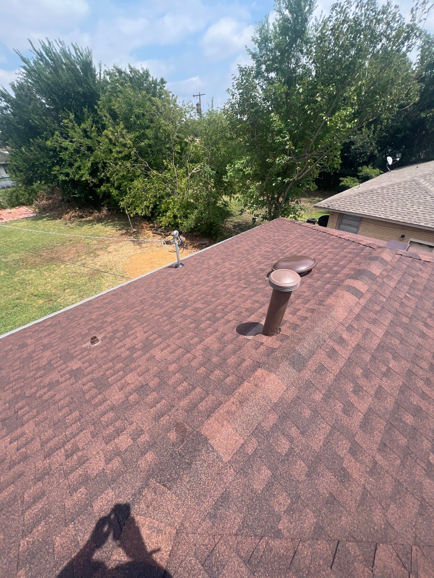 Roof Replacement and Gutter Installation in Oklahoma City, OK by McCann's Roofing and Construction