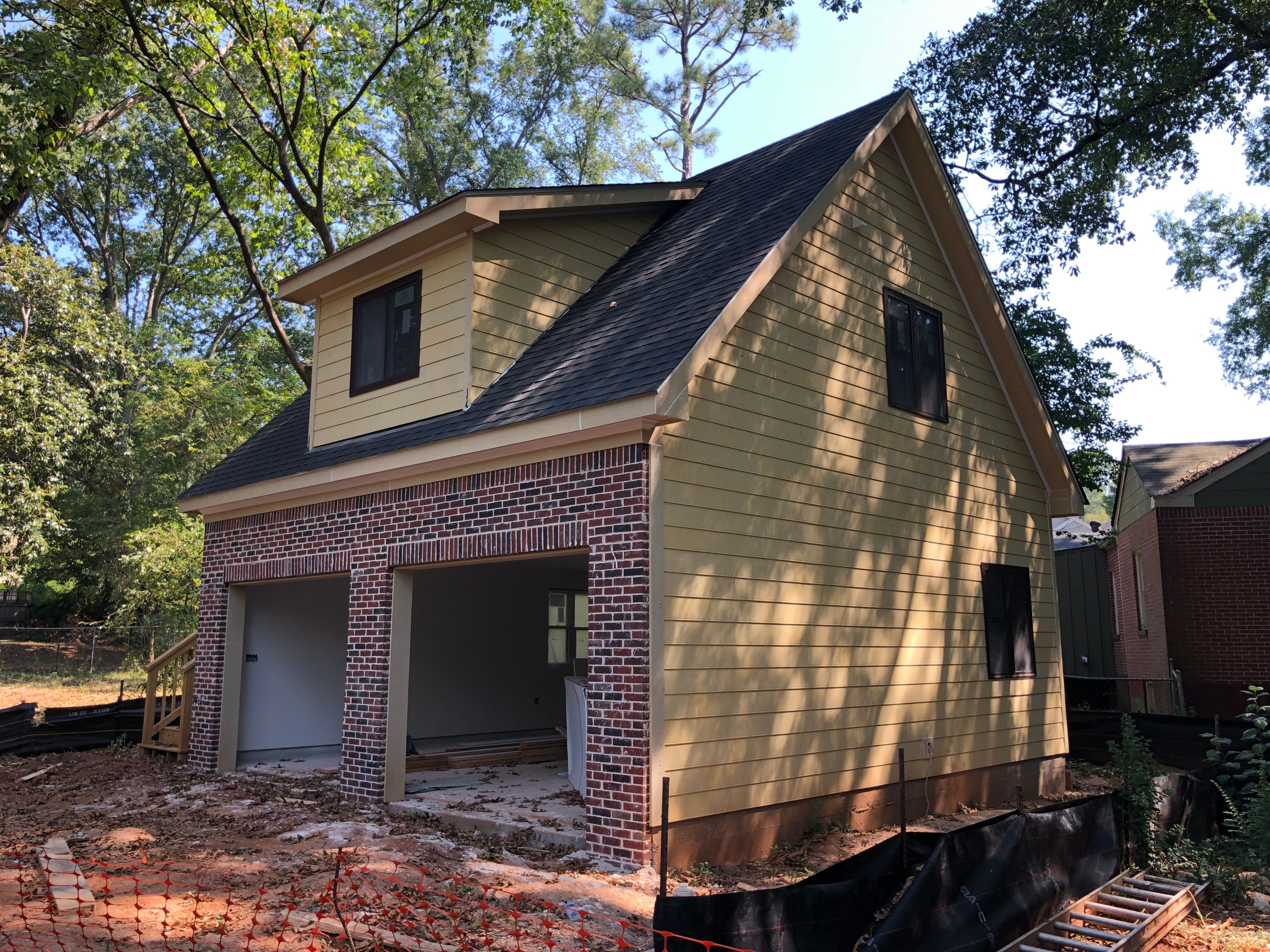 Custom Two-Story Brick Garage and Studio Apartment in Decatur by Swift Home Renovations 