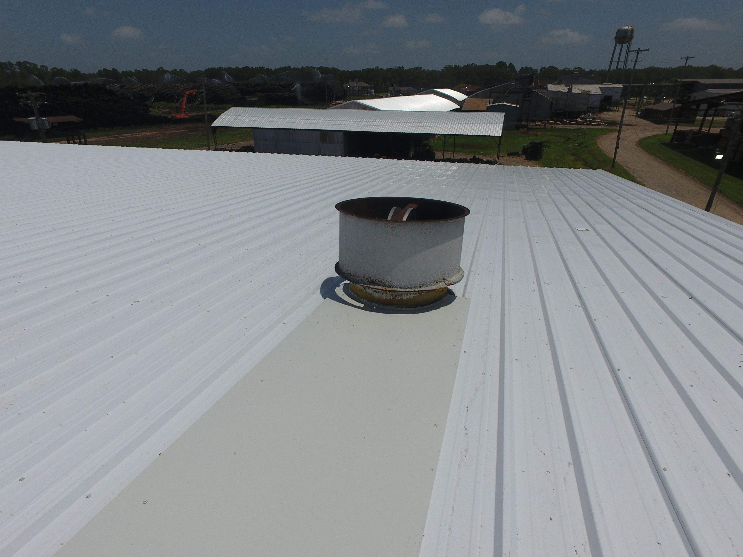 Commercial Roofing Installation using Aluminum Roofing panels by Hostetler Roofing