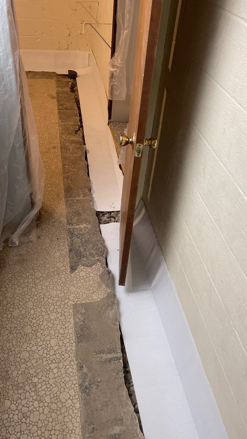 Interior Waterproofing Using GrateDrain™ Products by Toledo Basement Repair