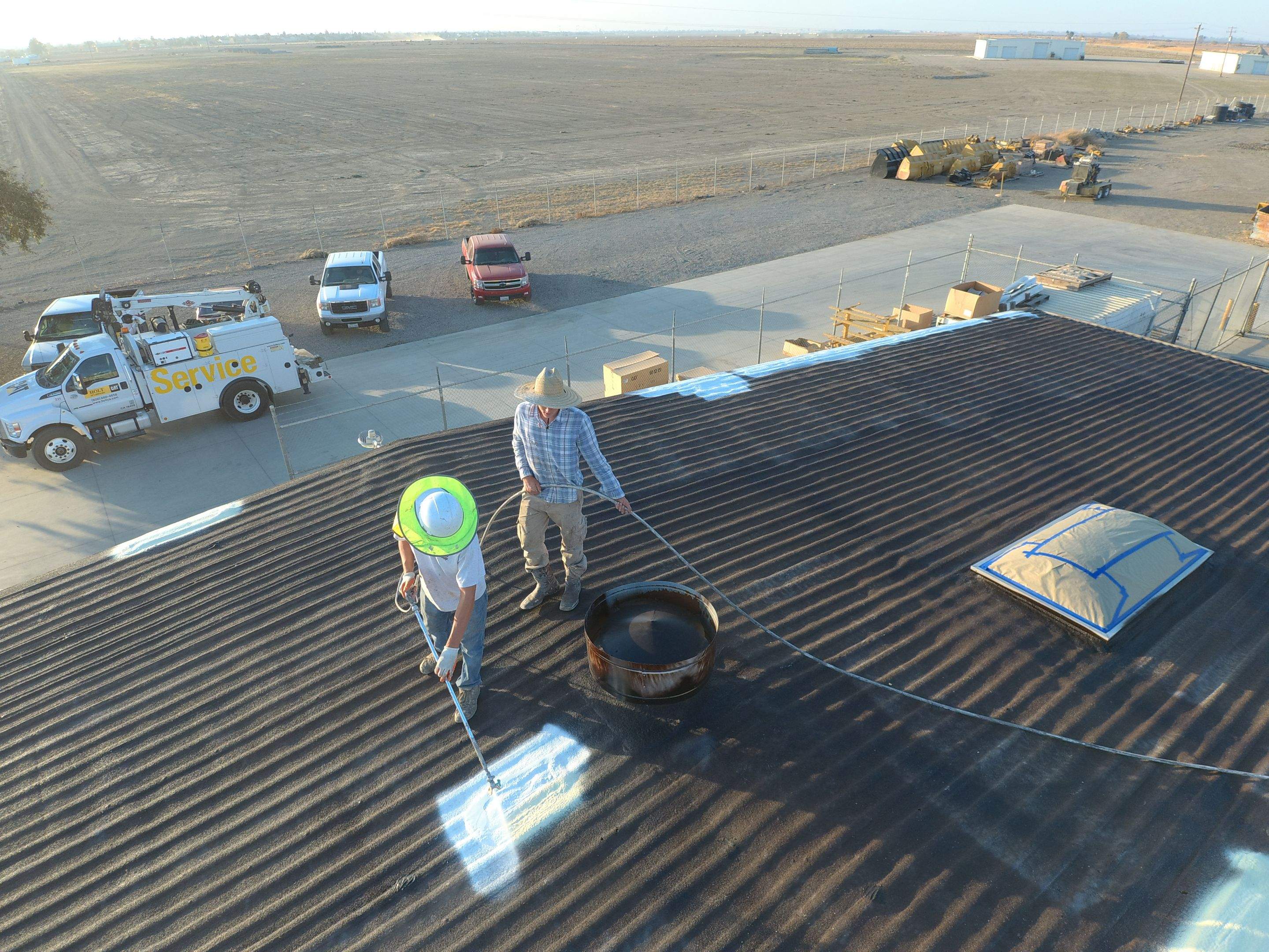 Metal roof restoration on commercial roof using Conklin Benchmark/ PUMA XL acrylic coatings over metal and foam by Straight Edge Roofing Inc