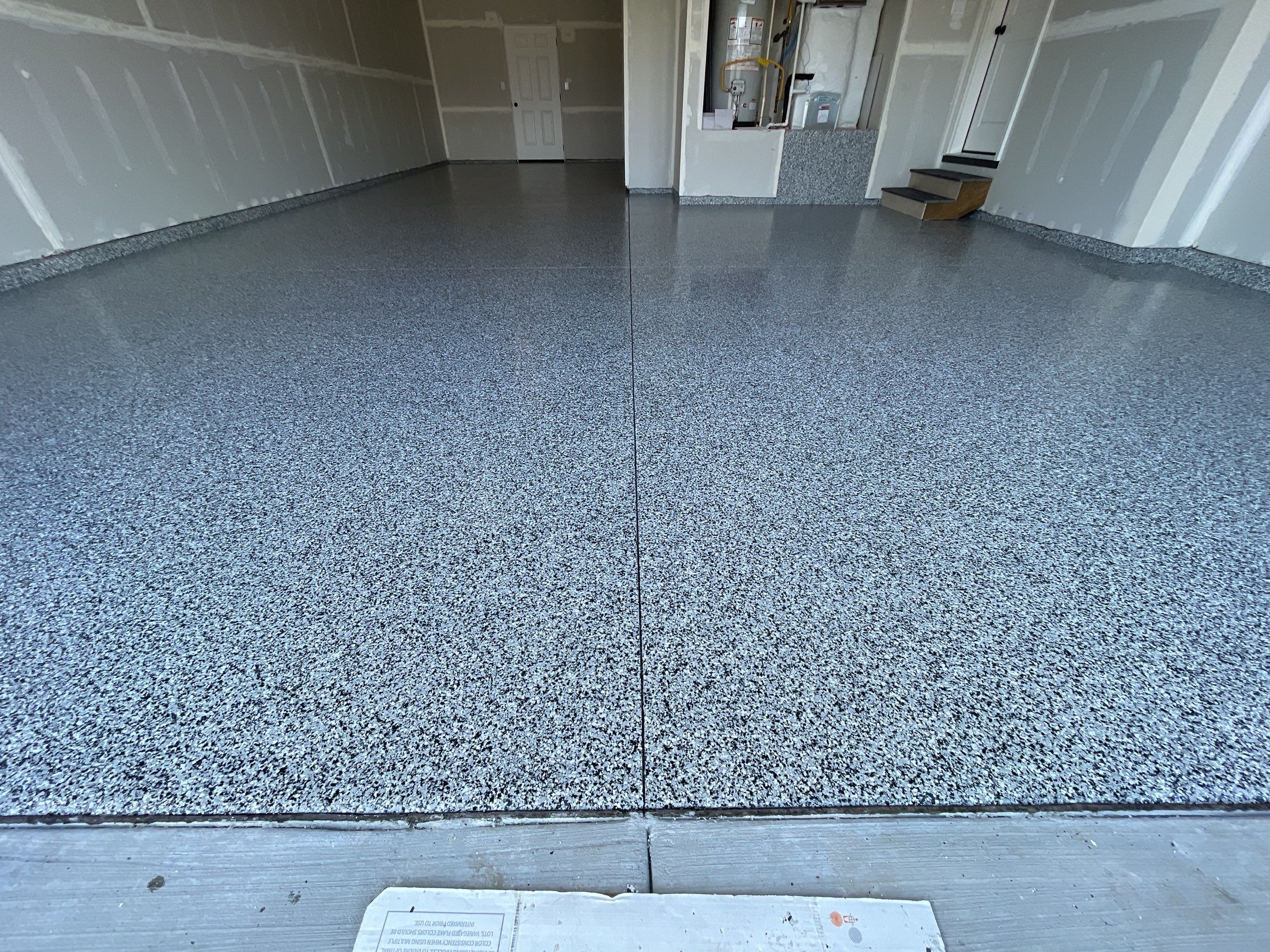 Garage Transformation using Domino by Croc Coatings, LLC