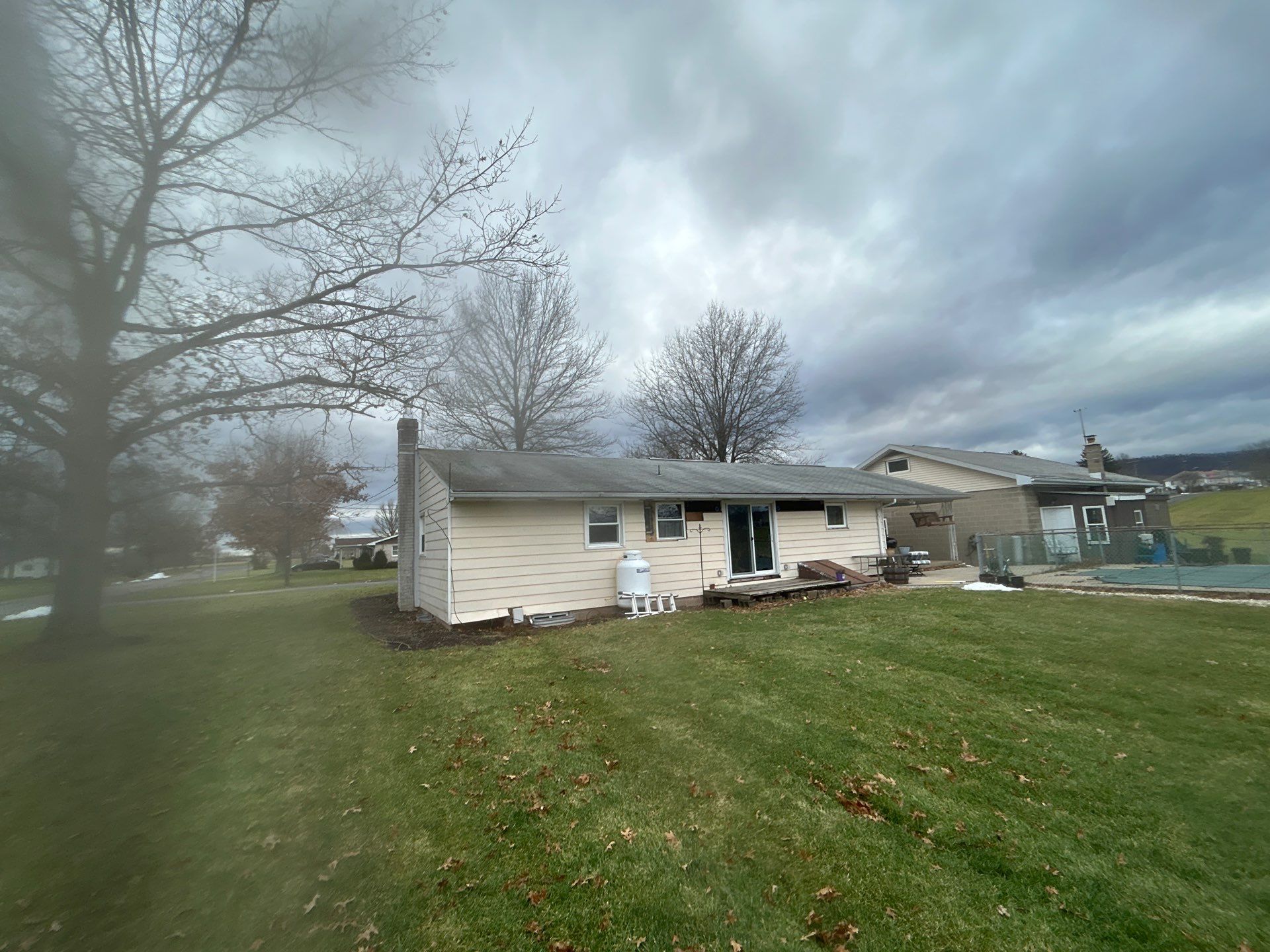Shingle Roof- new siding- entry door by Esh Builders