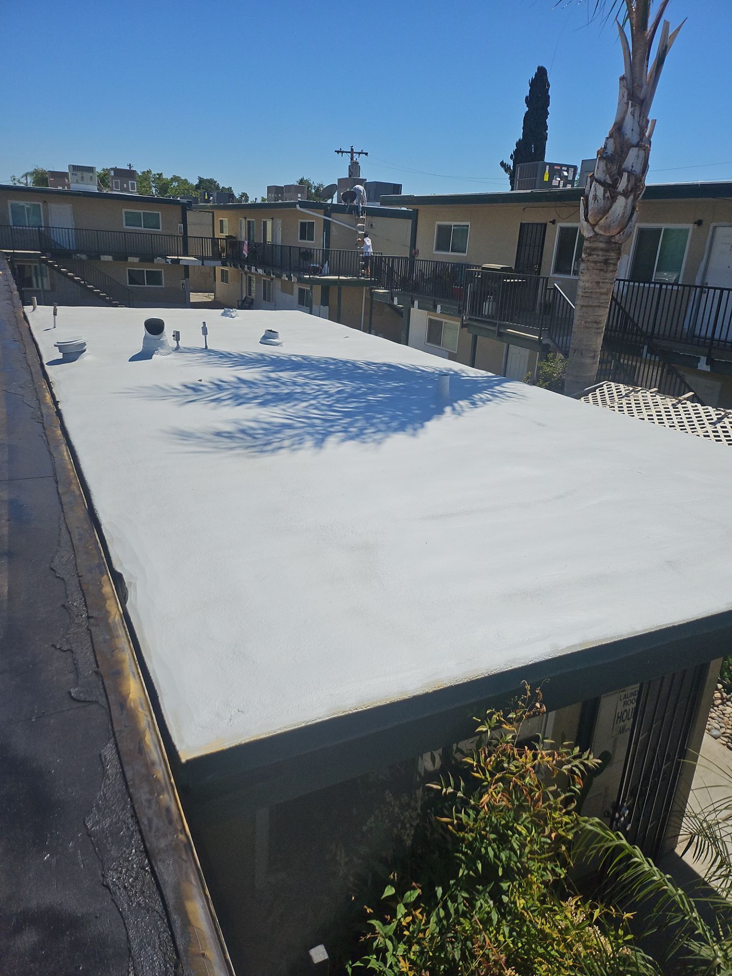 Foam Refurbish using General Coatings acrylic coatings and spray foam by Straight Edge Roofing Inc