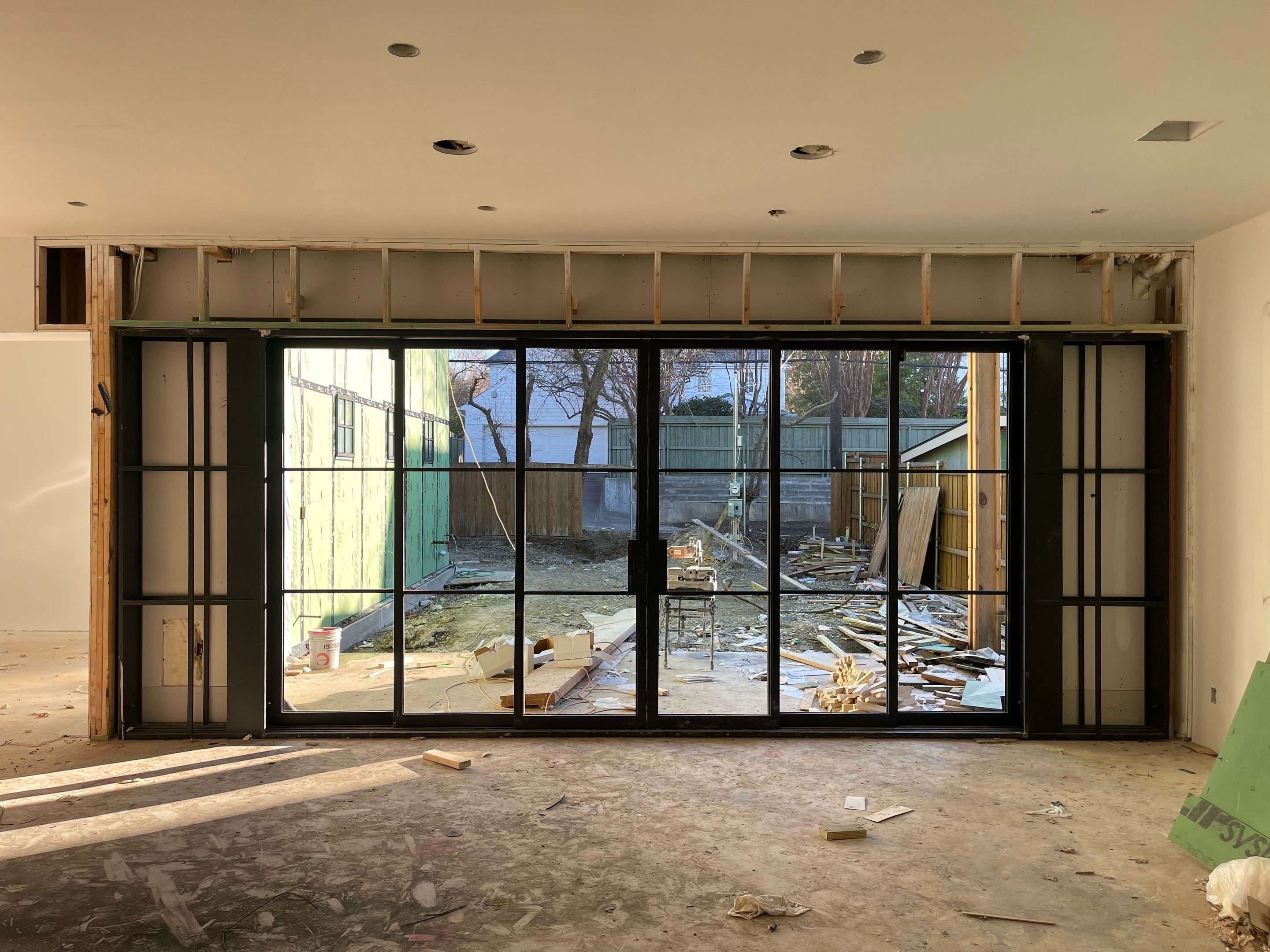 Custom 6-Panel Bi-Parting Sliding Pocket Door Installation in Dallas by Solara Custom Living
