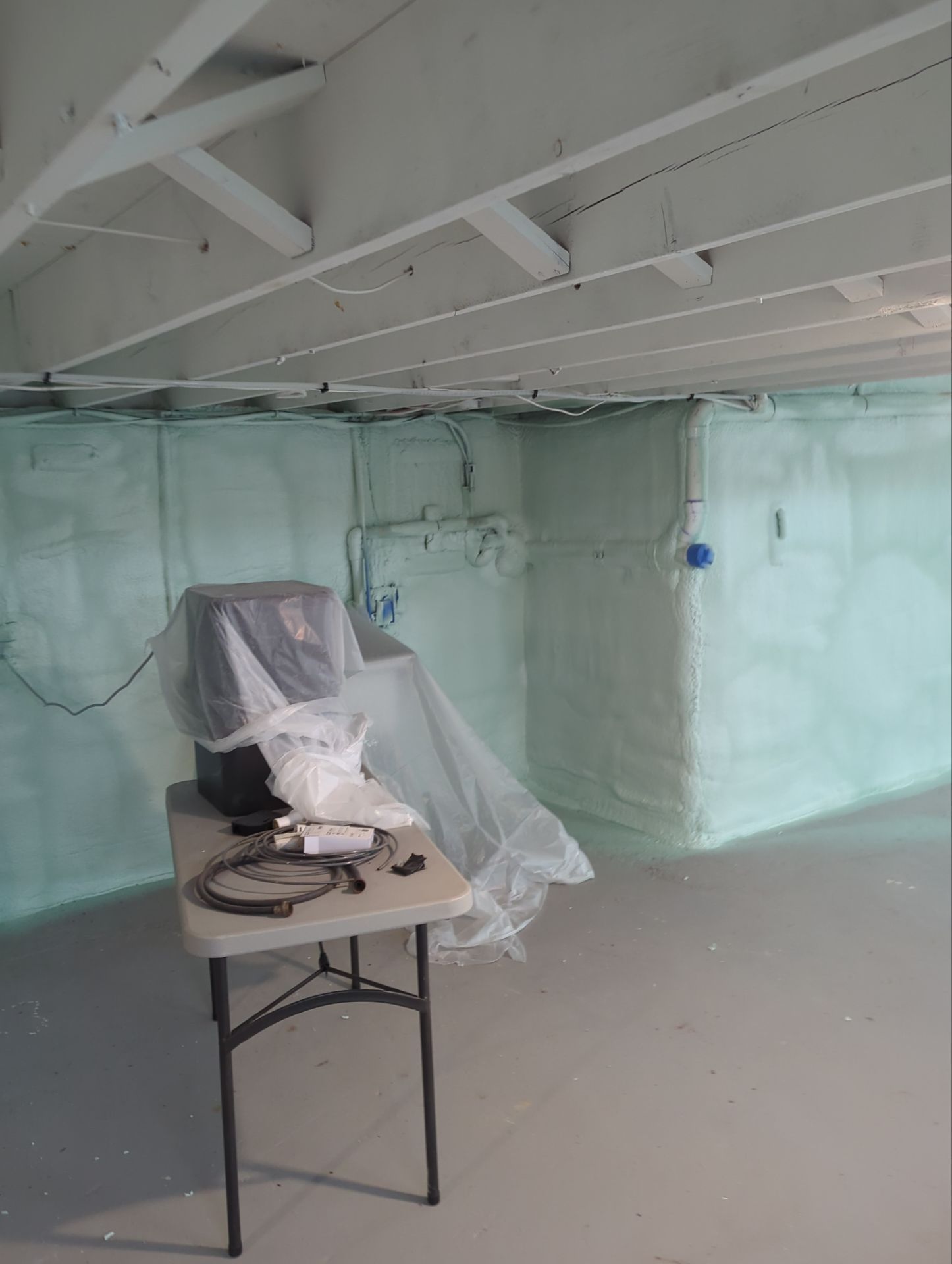 Basement Exterior Walls using Closed Cell Spray Foam by NYS Foam & Energy