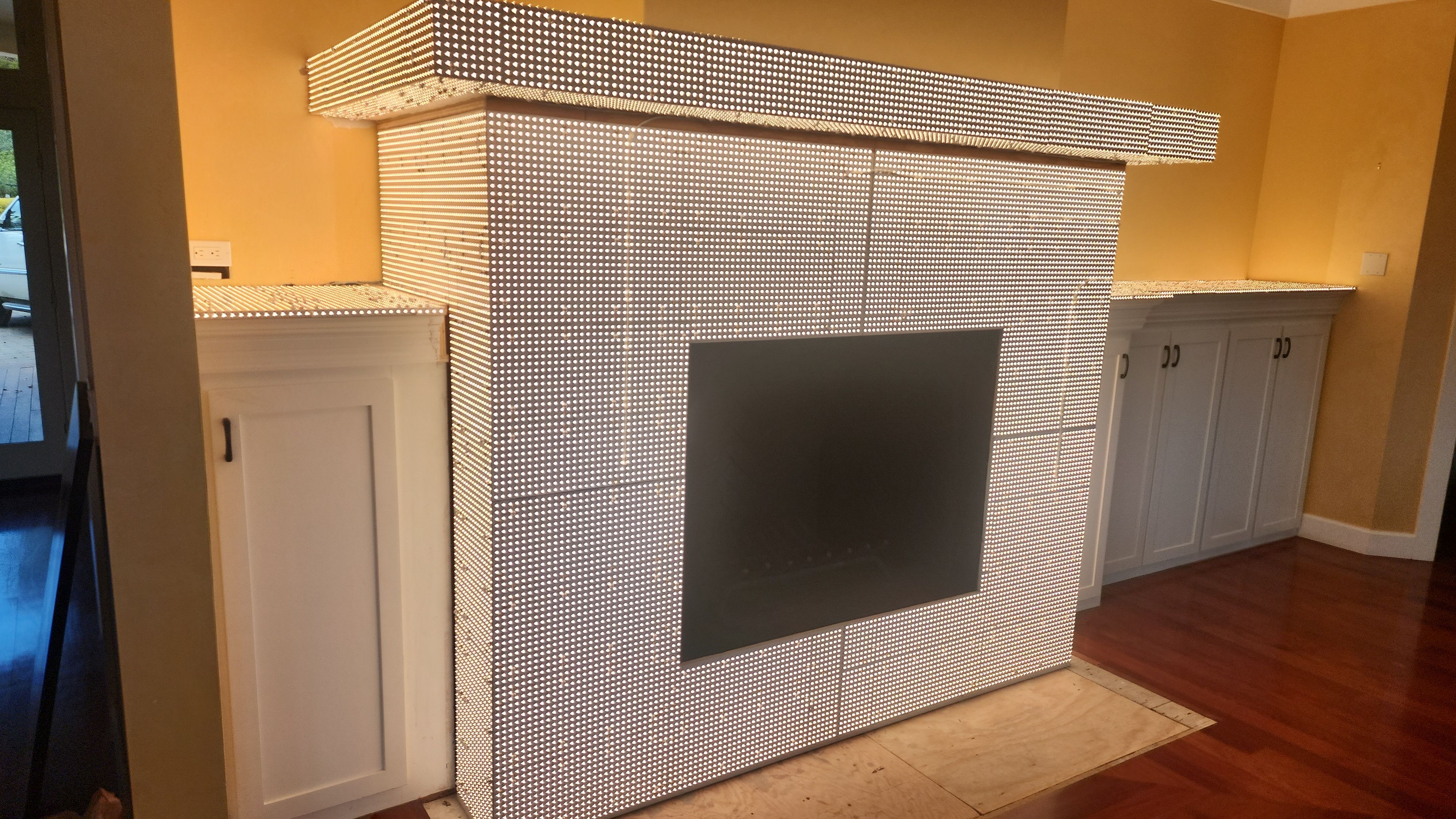 Backlit Stone On A Fireplace by S.Y. Electric Inc.