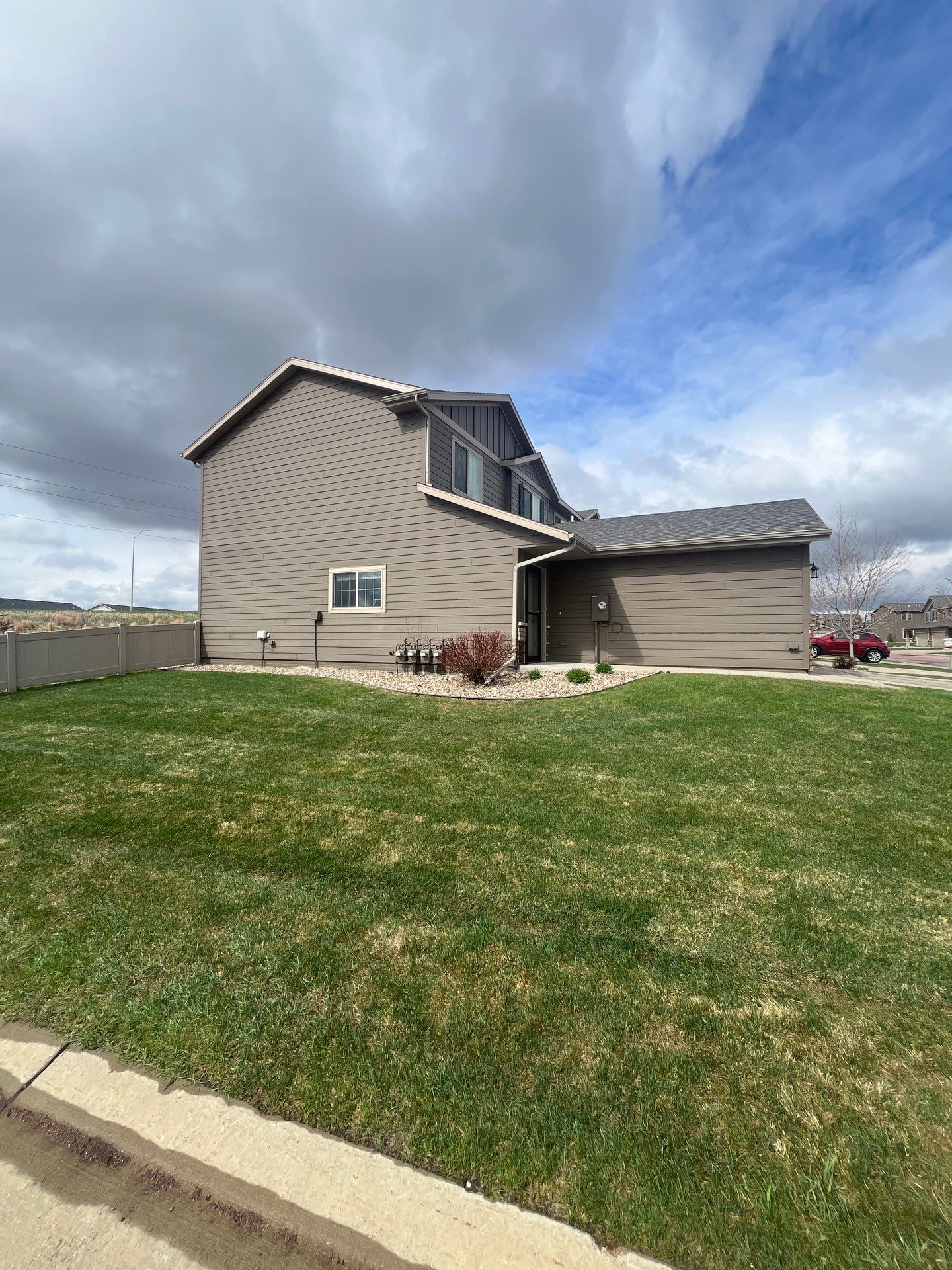 Exterior Painting for Multi-Unit Townhomes in Sioux Falls by Select Painting, Coatings & Garage Cabinets