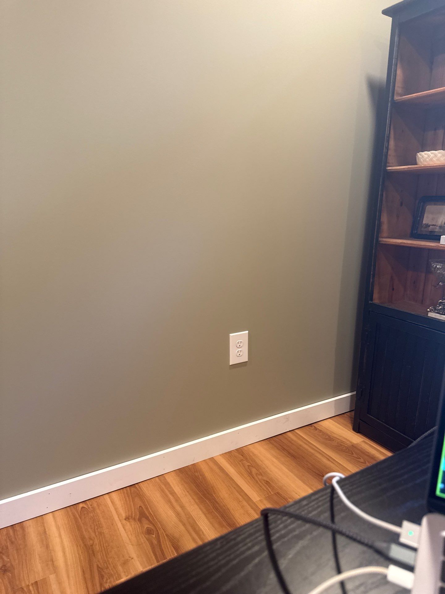 Lincoln Interior Renovation Featuring Sage Green Walls and Laminate Flooring by CompanyCam Sales Demo
