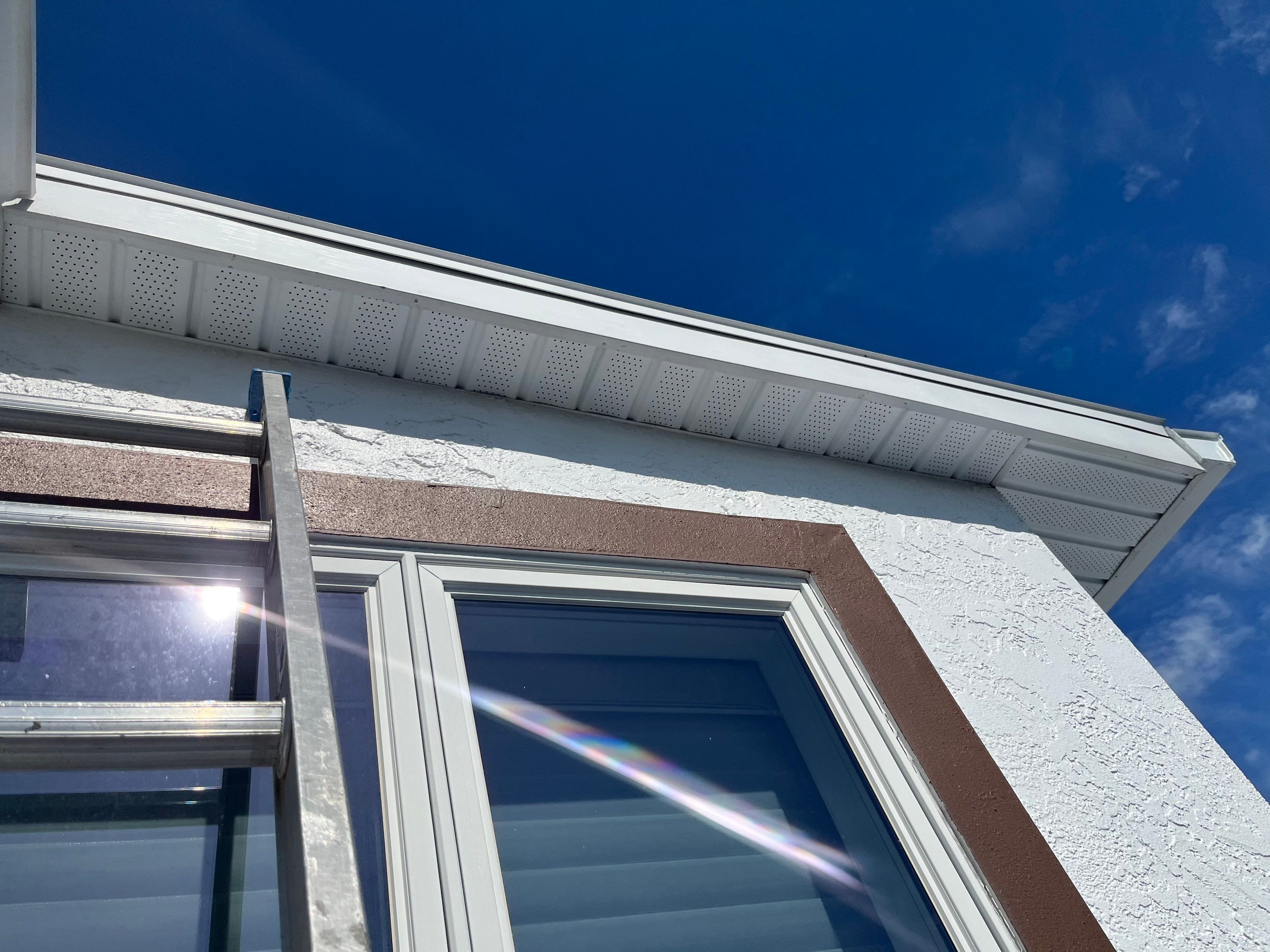 Repainting and Upgrading Gutters in Sarasota FL by Gutter Professors