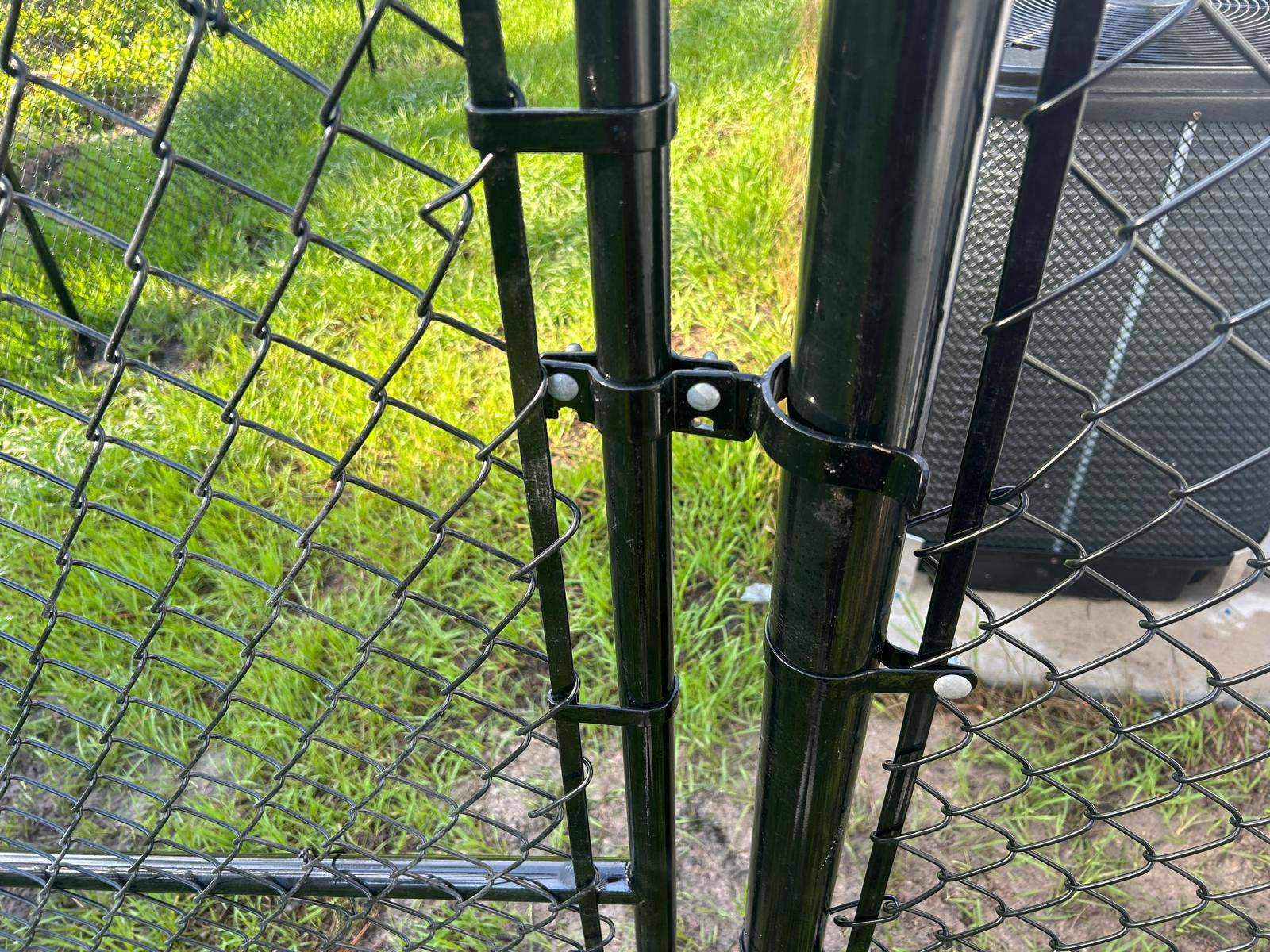 Residential Black Vinyl-Coated Chain Link Fence in Port Charlotte by True Fence LLC