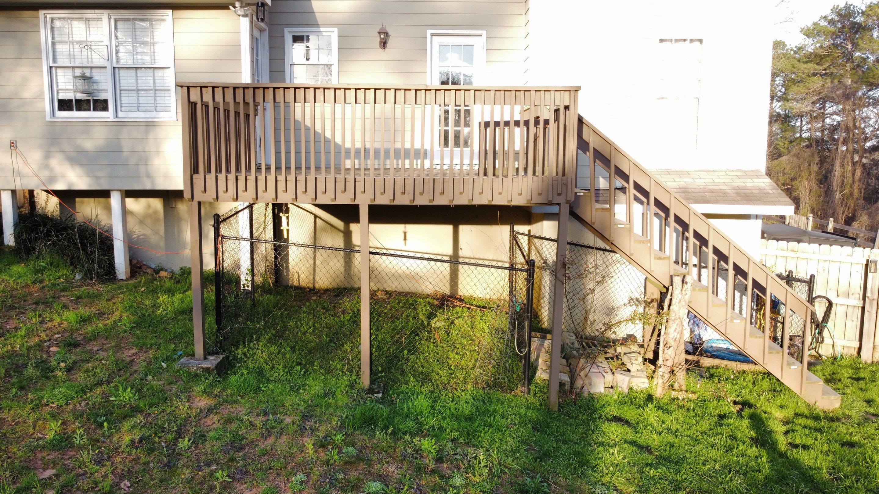 Elevated Pressure-Treated Wood Deck Replacement in Marietta by Swift Home Renovations