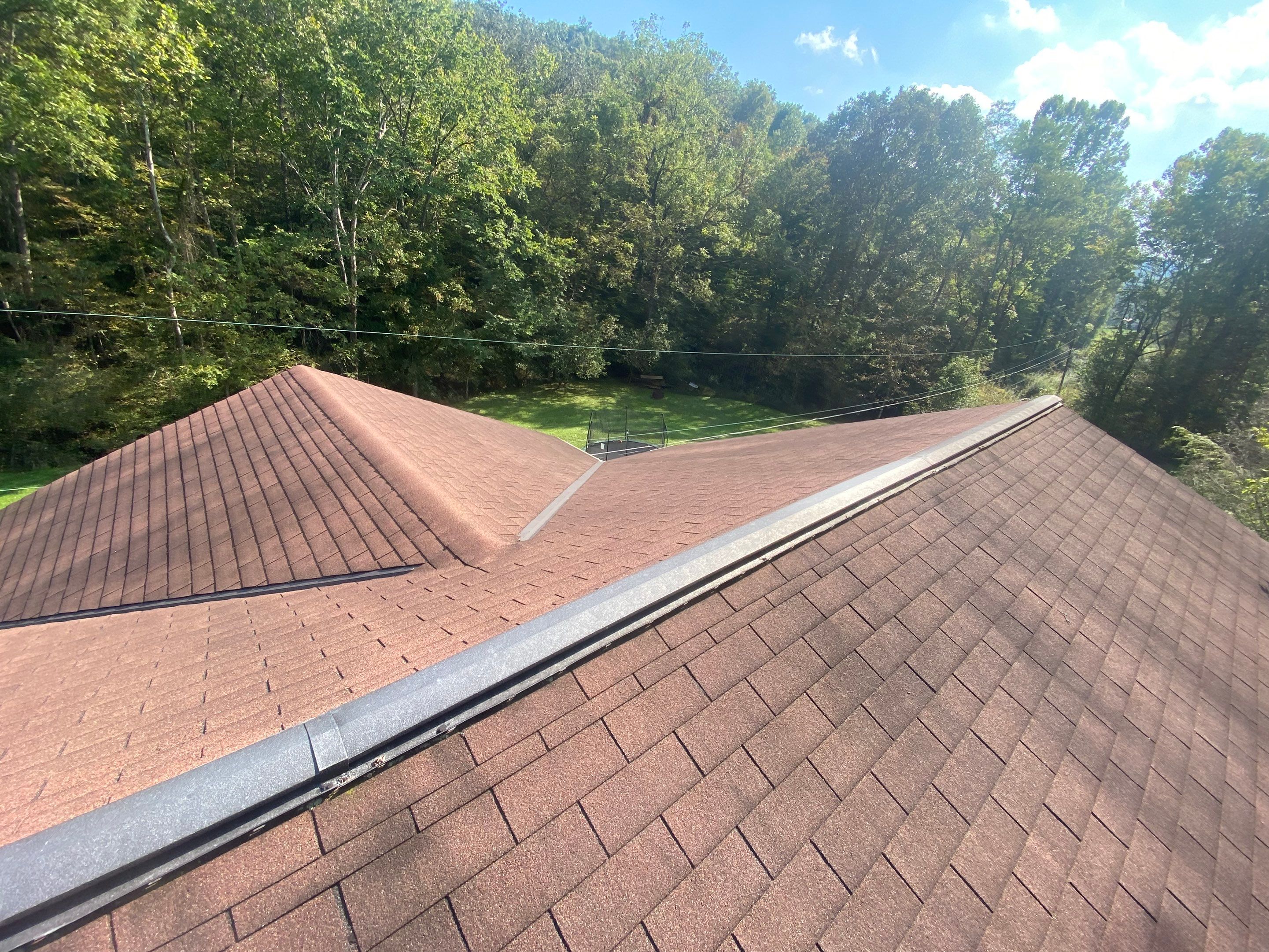 Metal Roof and Vinyl Siding, Soffit, Gutters using LifeTite Premium metal roofing  by Secure Construction Company Inc