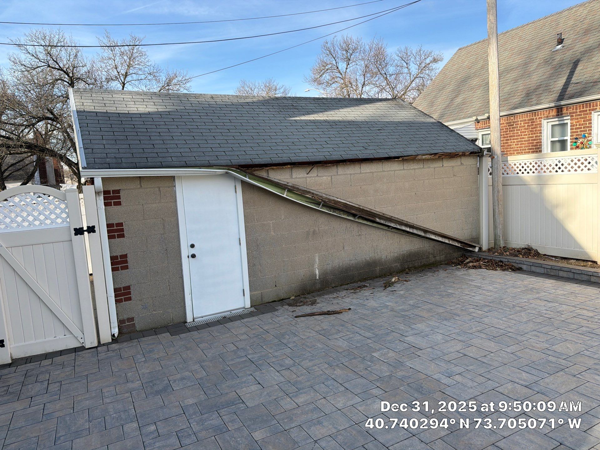 Queens Garage Fascia Rebuild + New 5" Seamless Gutter by Above All Gutters 