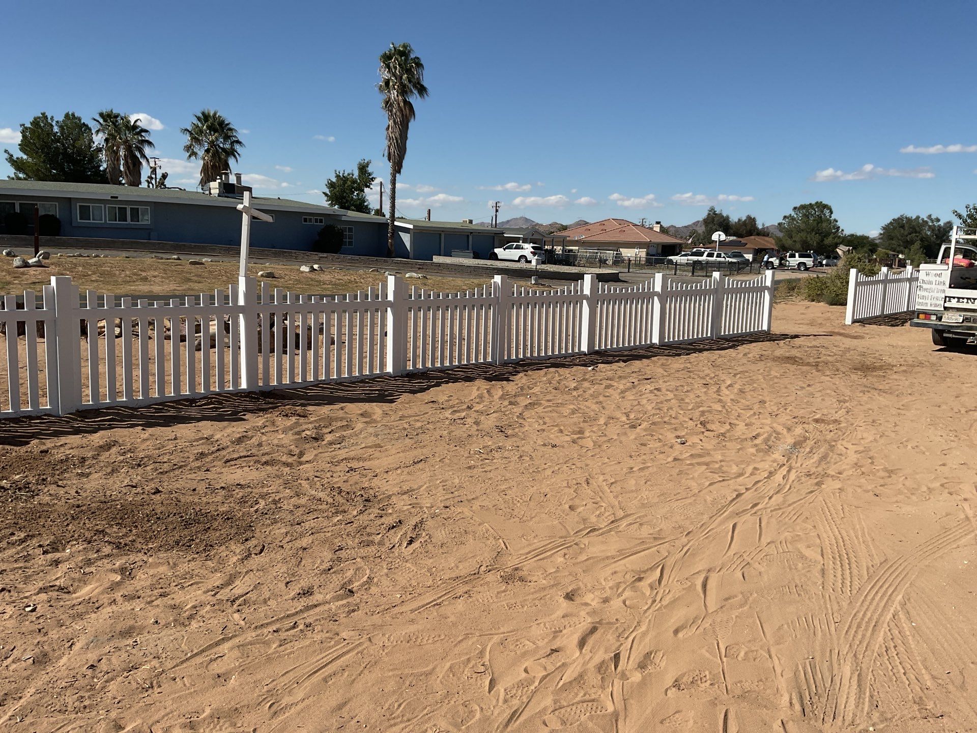 White picket fence  by Fence Guys Inc. 
