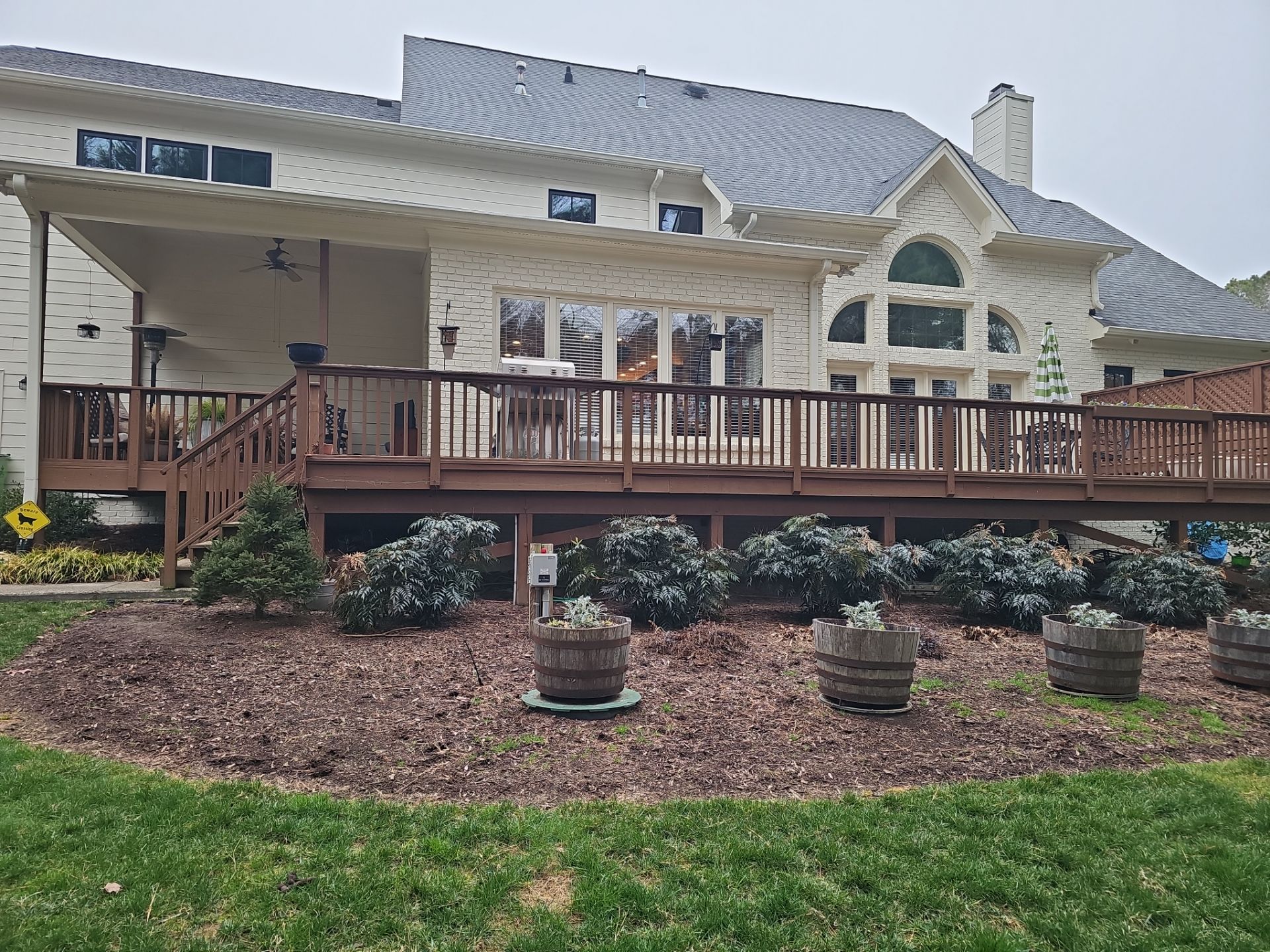 Deck Stain, Round Balusters & Screened Porch Transformation by Billy Weatherspoon Contractor