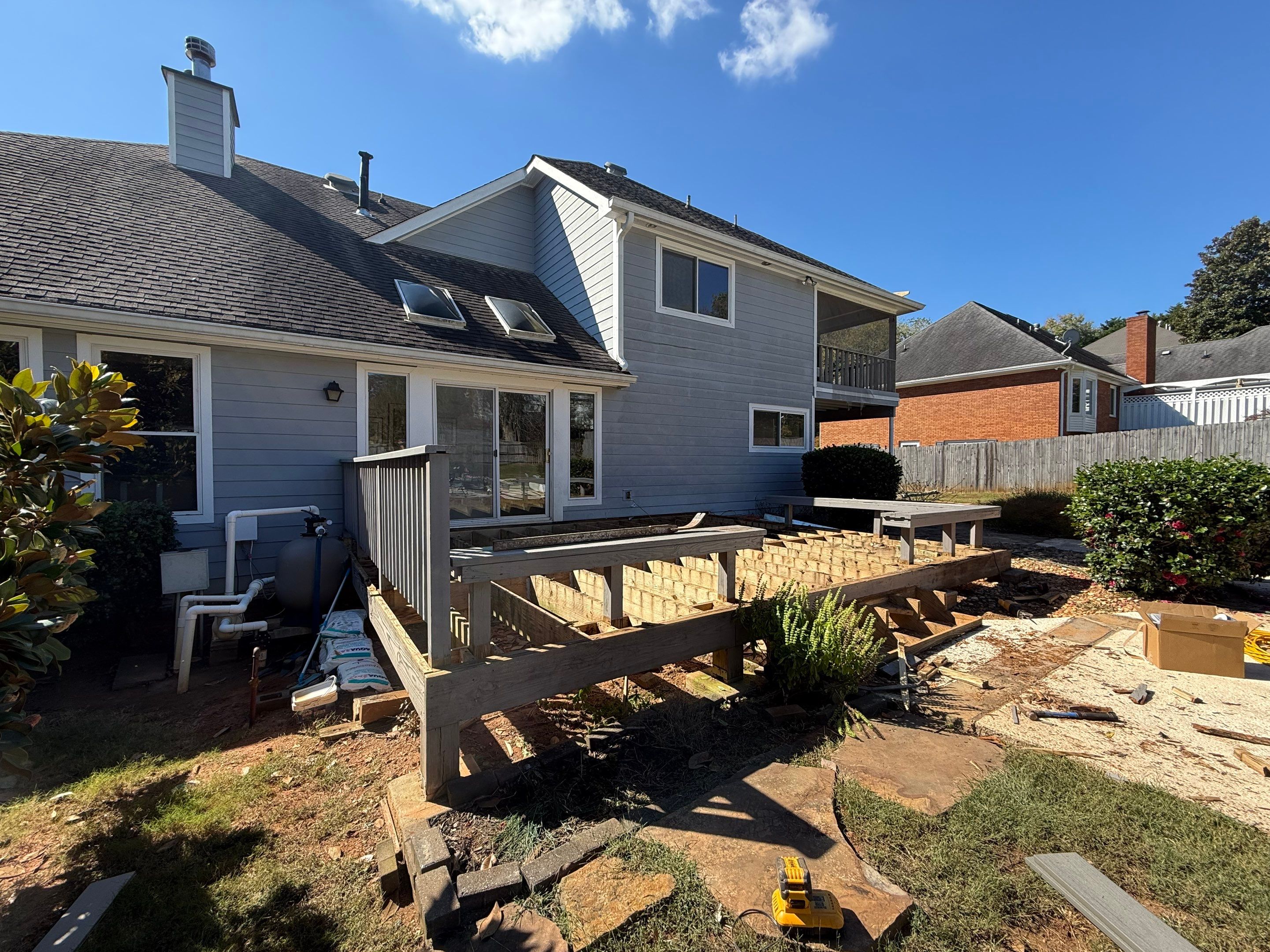 Custom Composite Deck with Integrated Seating in Roswell by Swift Home Renovations