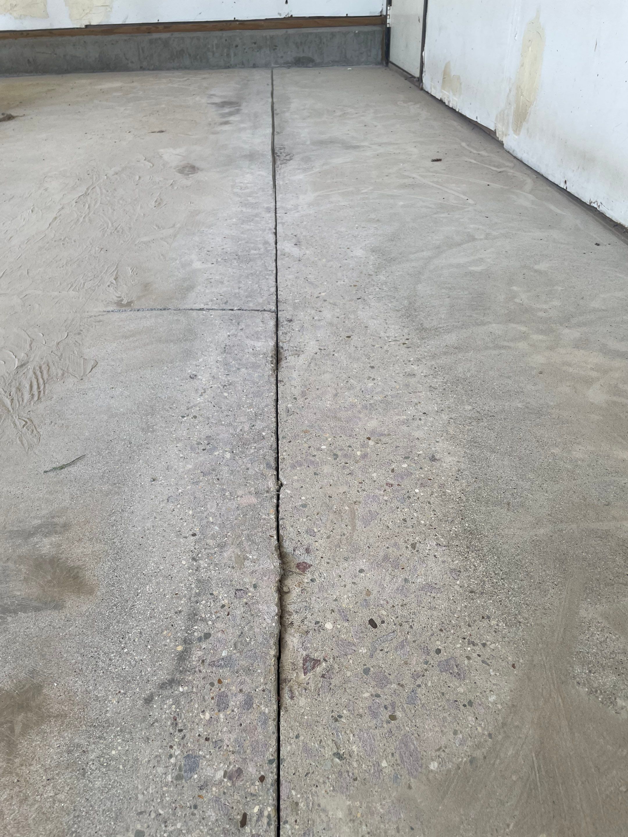Hartford Residential Garage Floor Transformation With Decorative Chip Coating by Select Painting, Coatings & Garage Cabinets