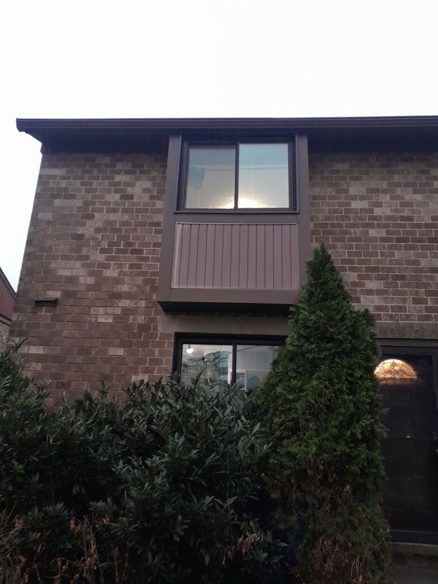 Bronze exterior Provia Sliding windows by Window Depot of Annapolis